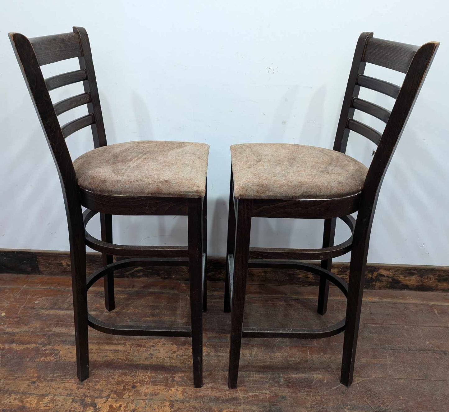 Pair of Brown High-back Bar Stools with Lightly Patterned Beige Fabric Seats