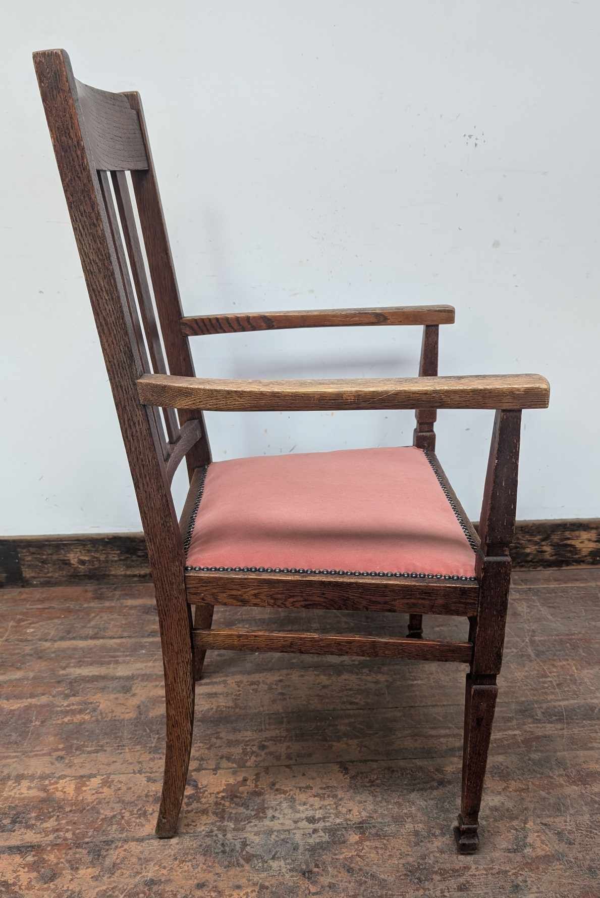 Brown Wooden Dining Armchair with Salmon-Pink Fabric Seat