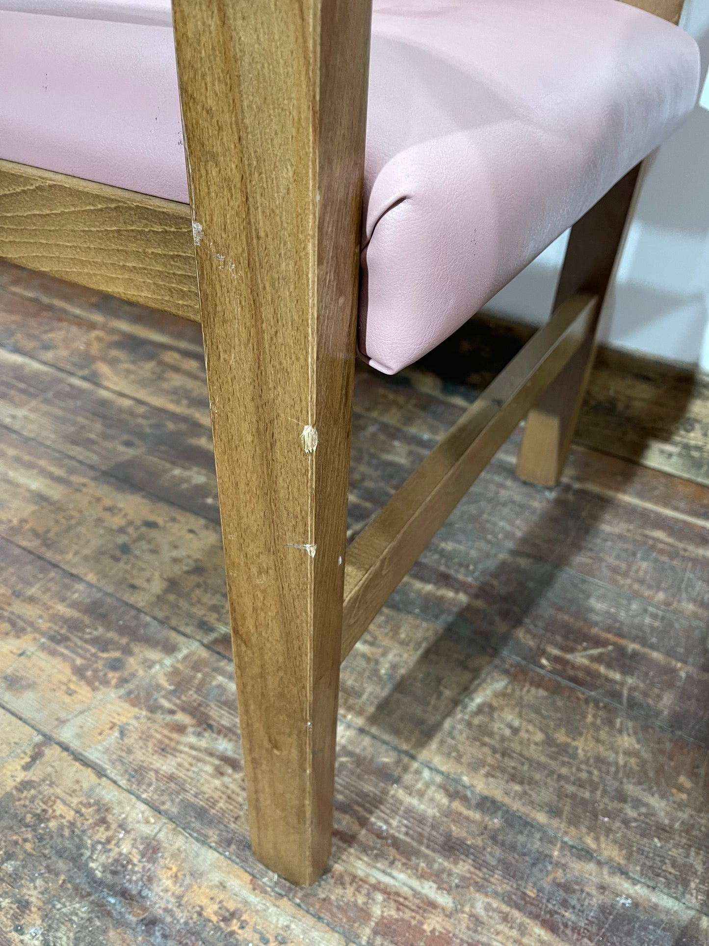 Matching set of 2 pale pink tub chairs in faux-leather