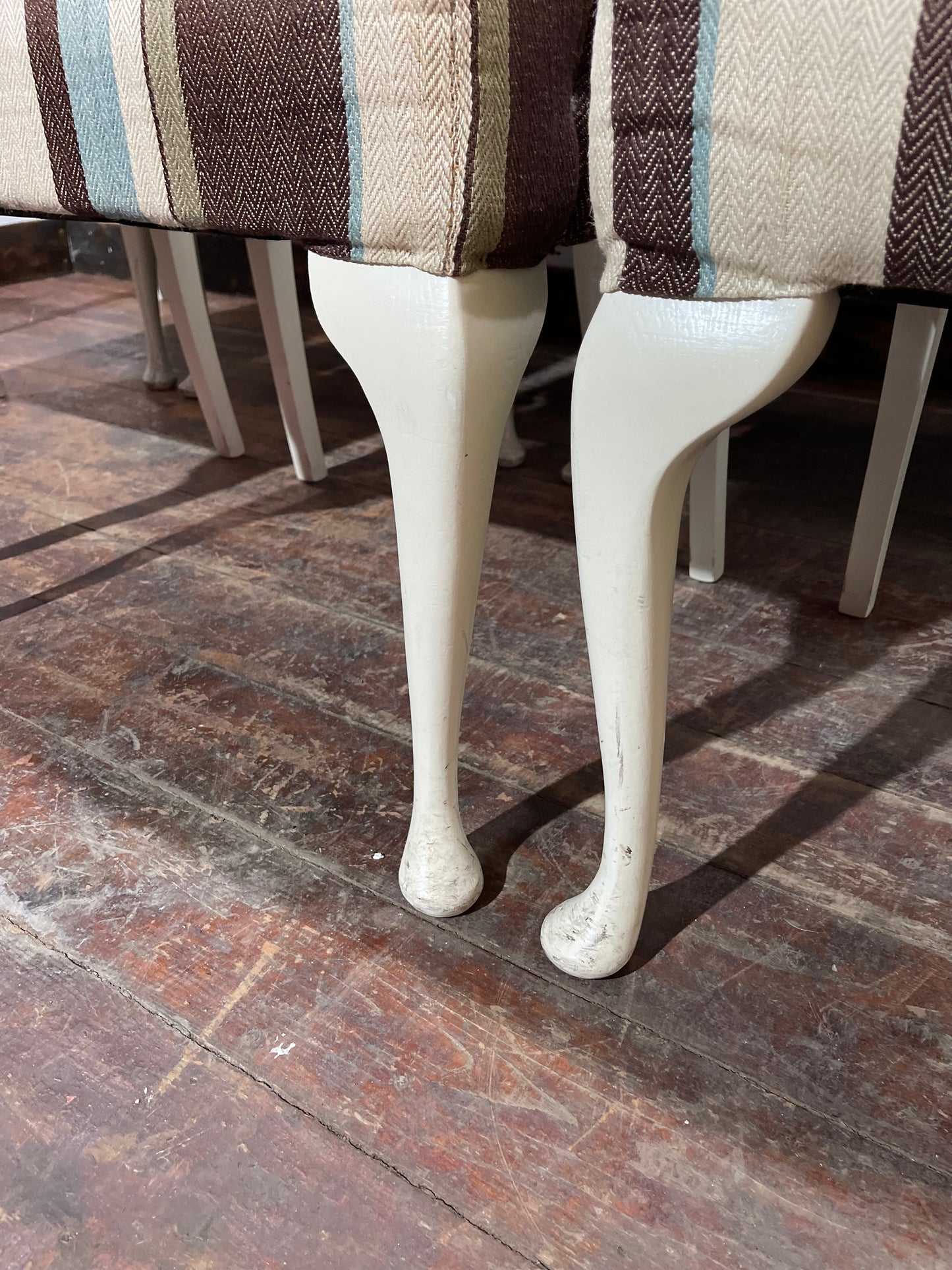 Matching set of 7 Chesterfield style dining chairs in striped fabric