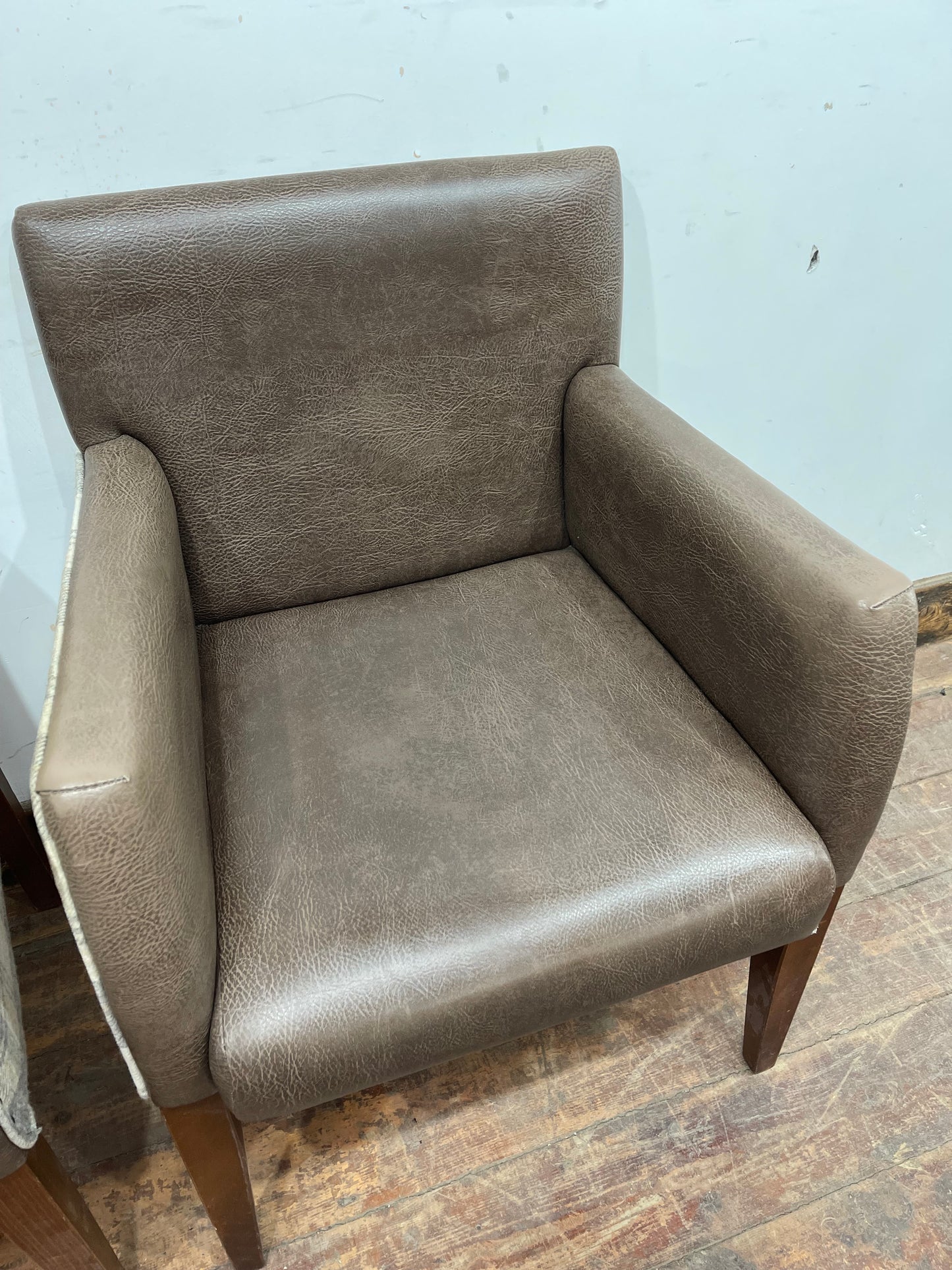 Pair of leather-effect armchairs / pub chairs with check tartan backs
