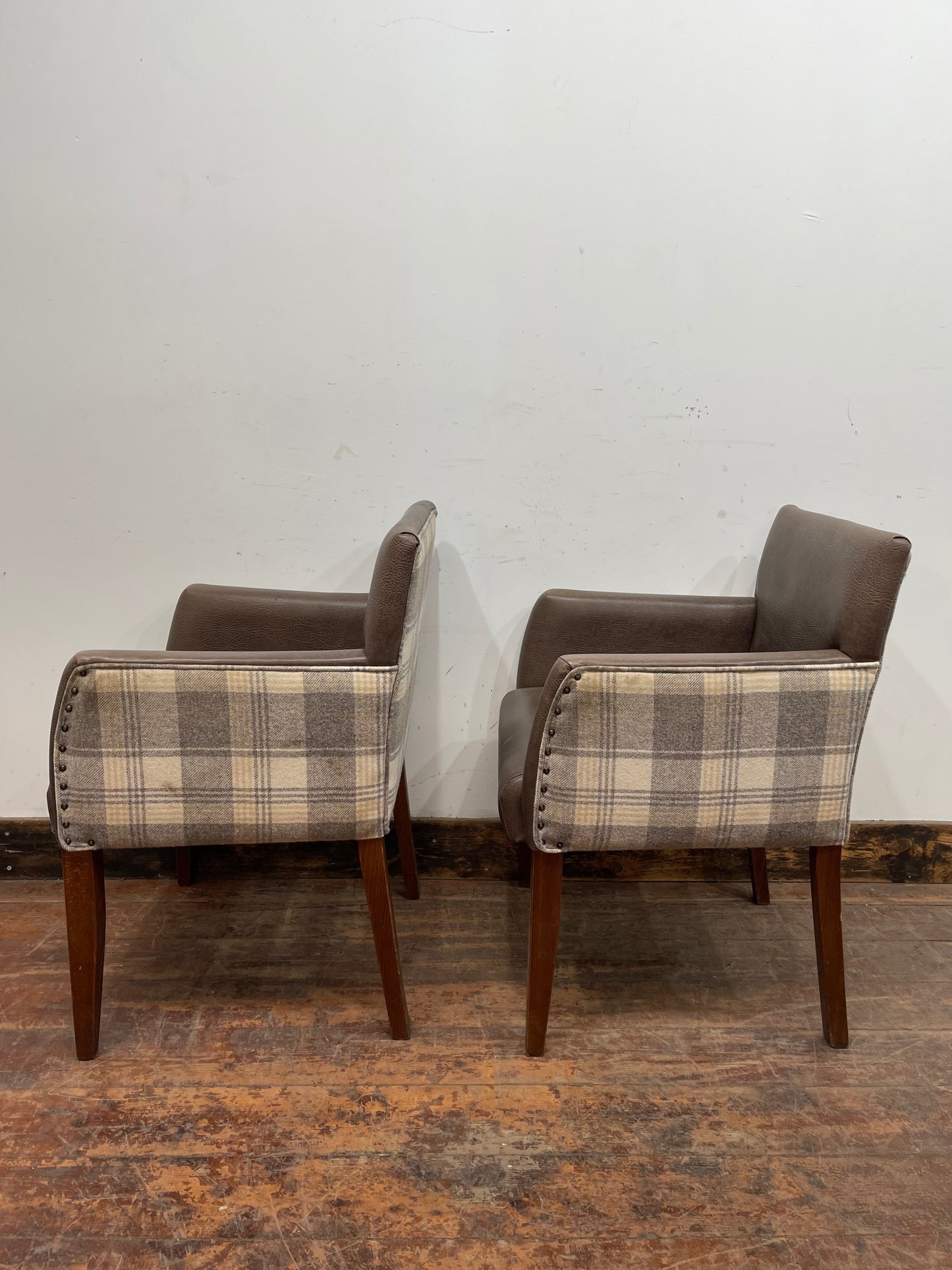 Pair of leather-effect armchairs / pub chairs with check tartan backs