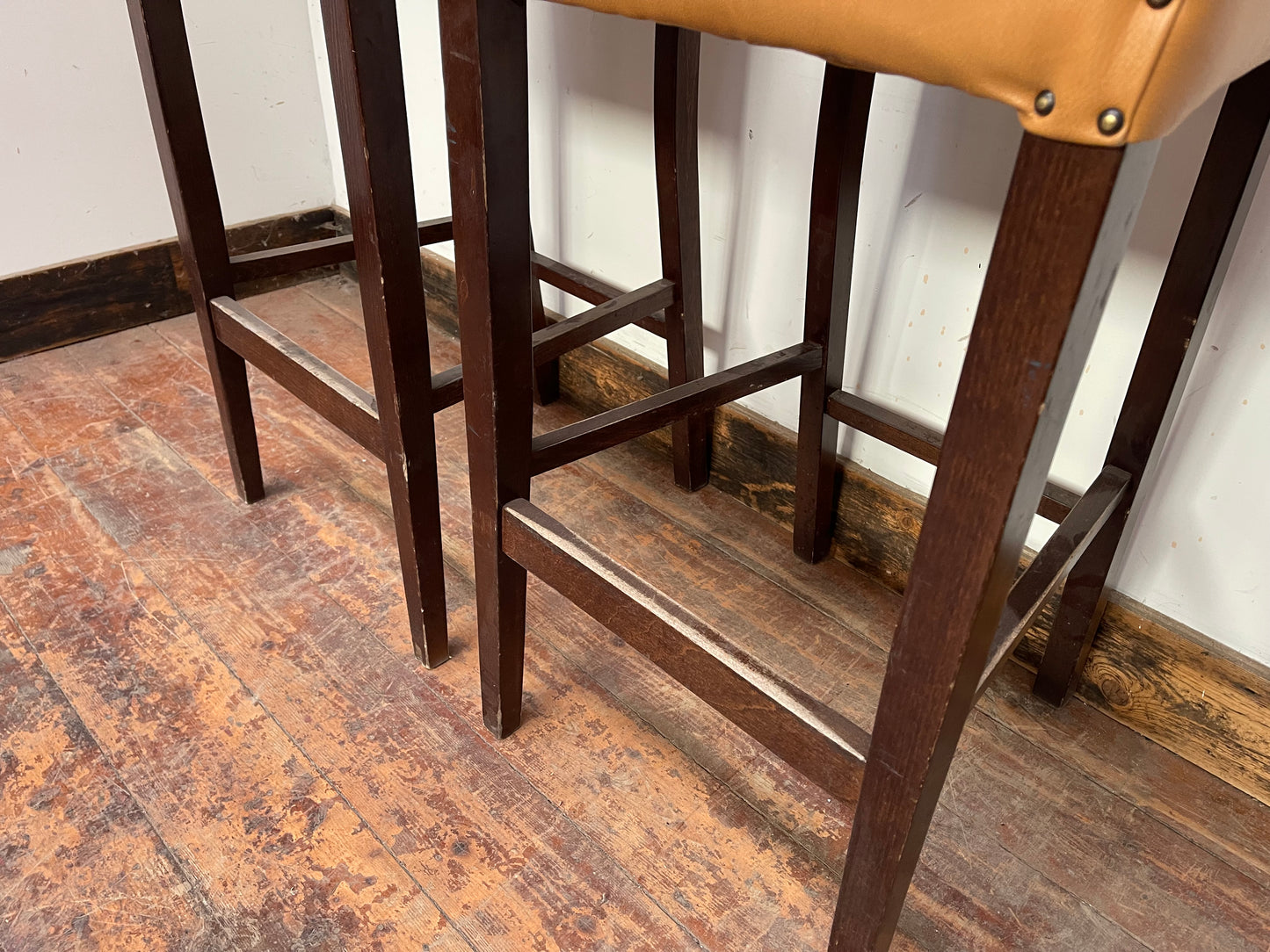 Pair of mustard yellow and patterned fabric bar stools