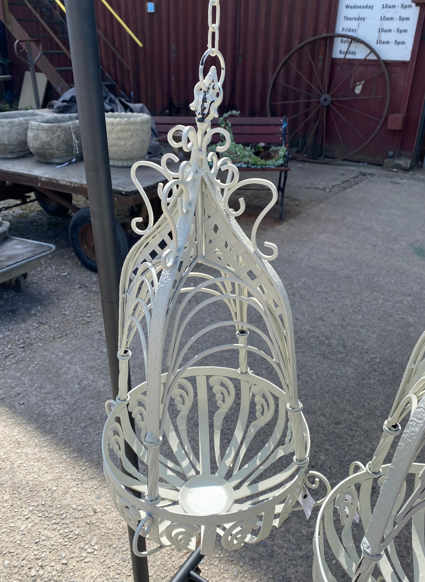Ornate metal hanging basket