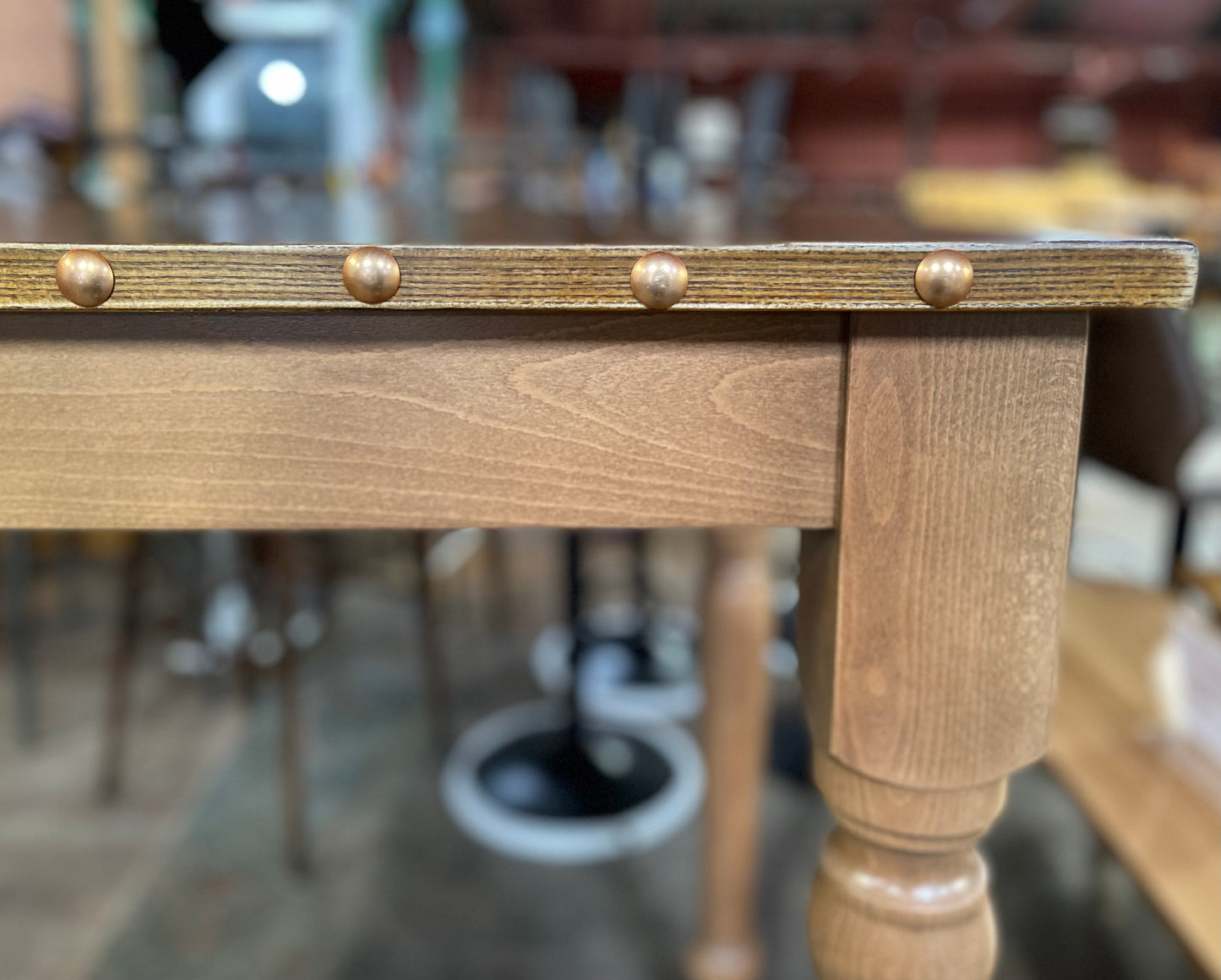 Rectangular poseur table with brass stud detail