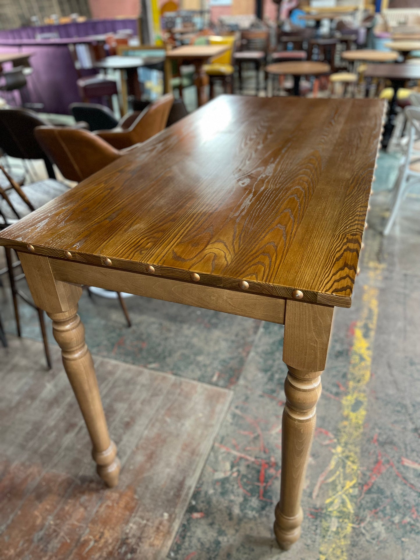 Rectangular poseur table with brass stud detail