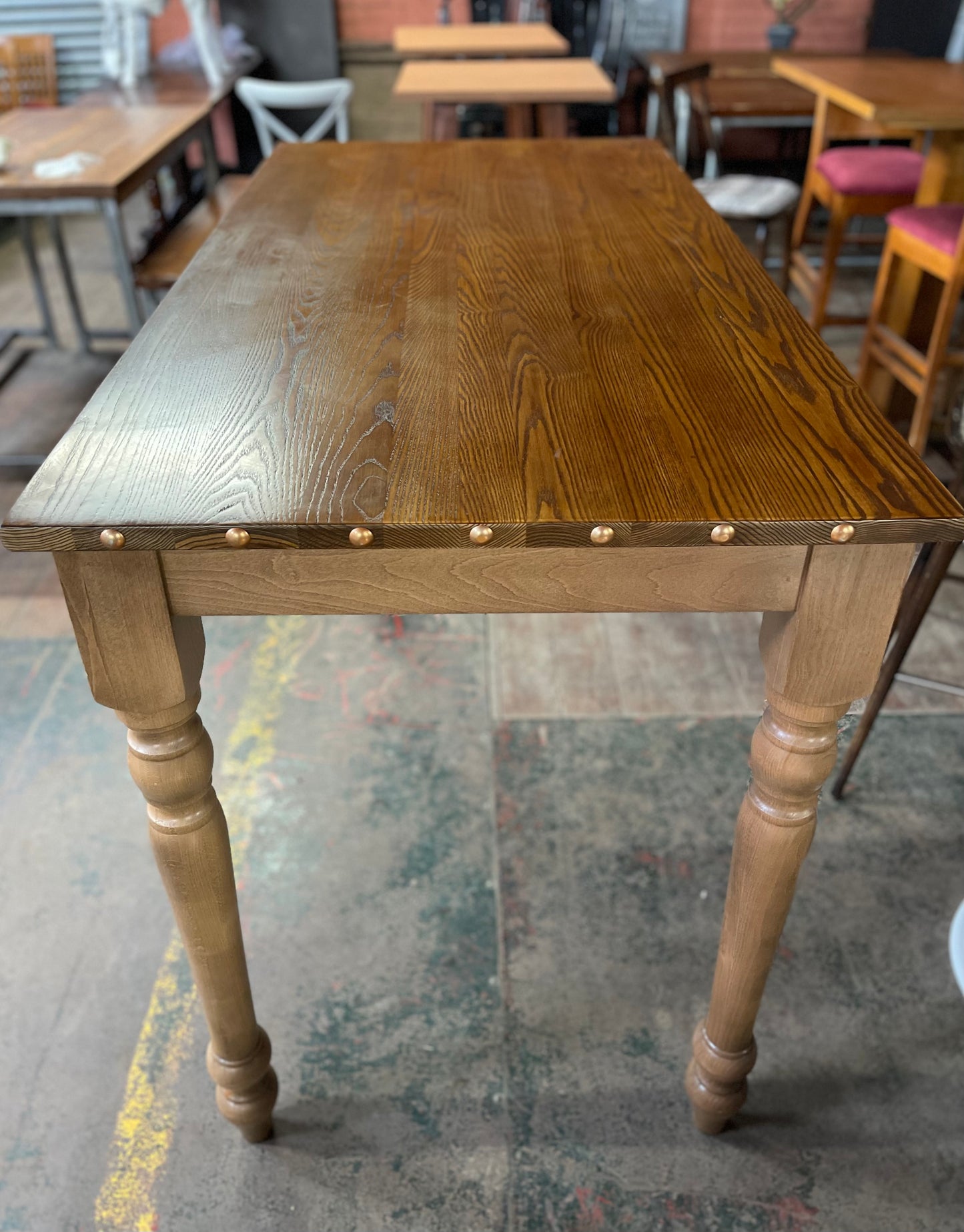 Rectangular poseur table with brass stud detail