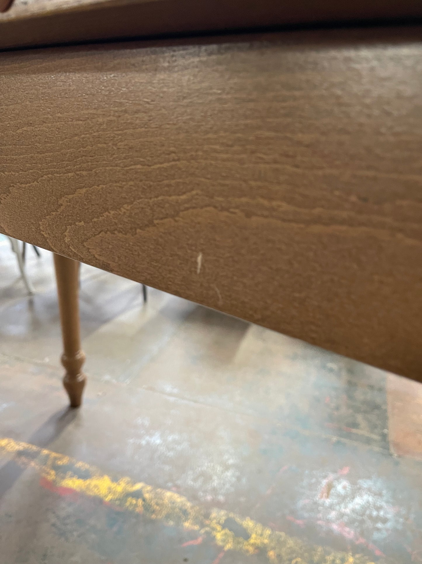 Rectangular poseur table with brass stud detail