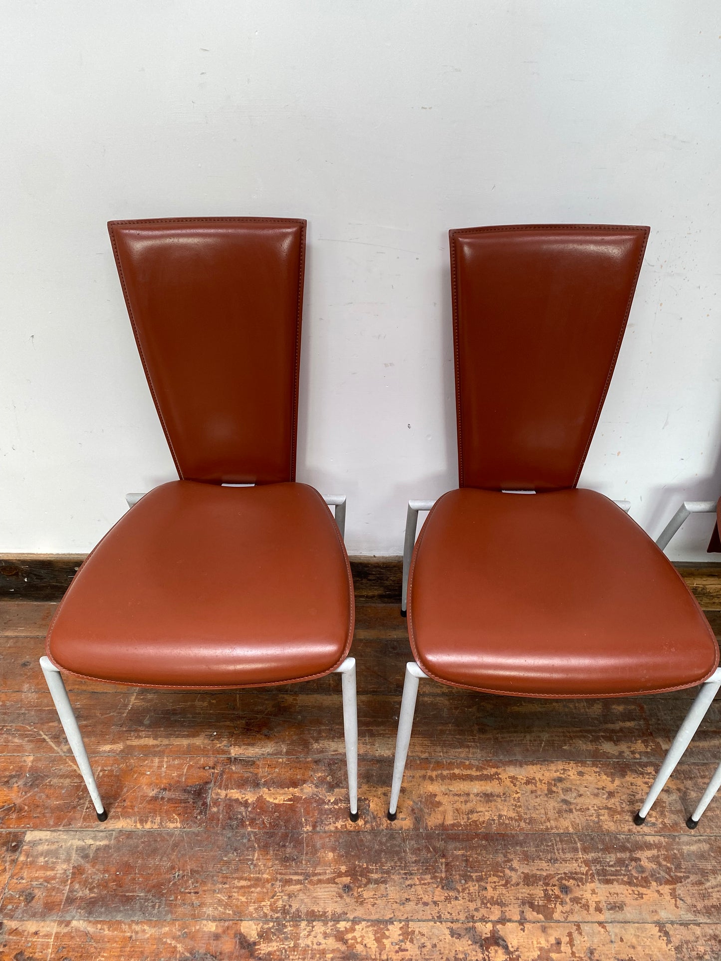 Set of four Italian leather dining chairs