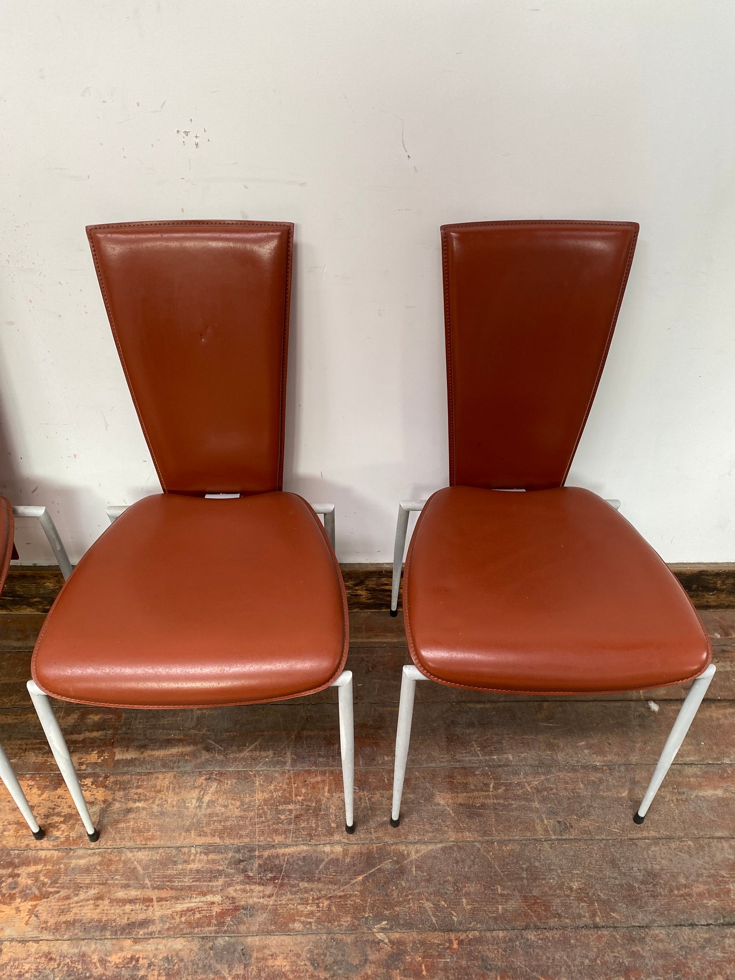 Set of four Italian leather dining chairs