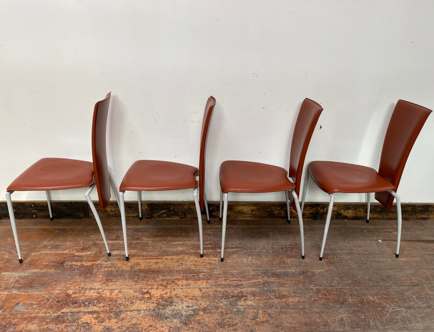 Set of four Italian leather dining chairs