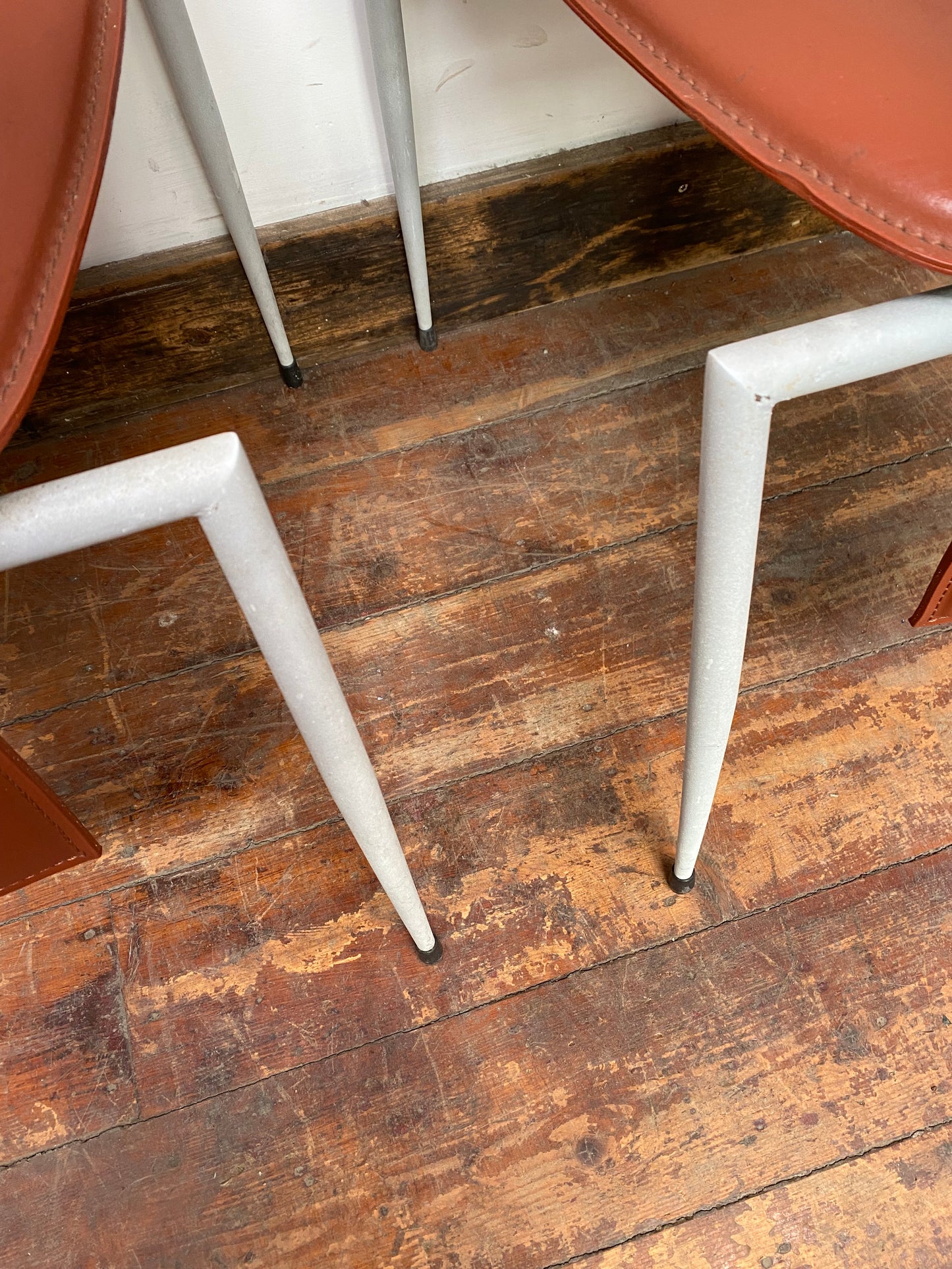 Set of four Italian leather dining chairs