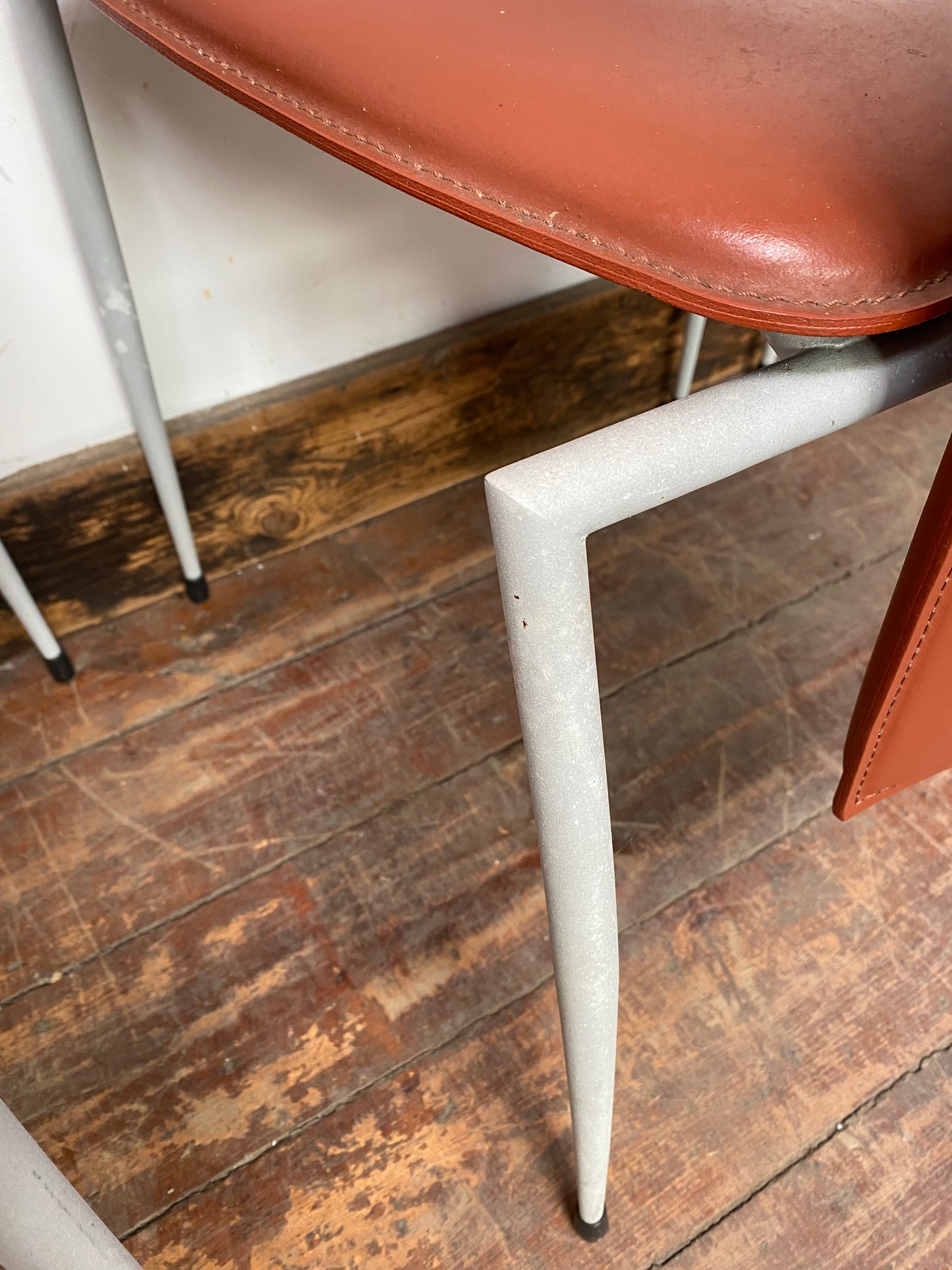 Set of four Italian leather dining chairs