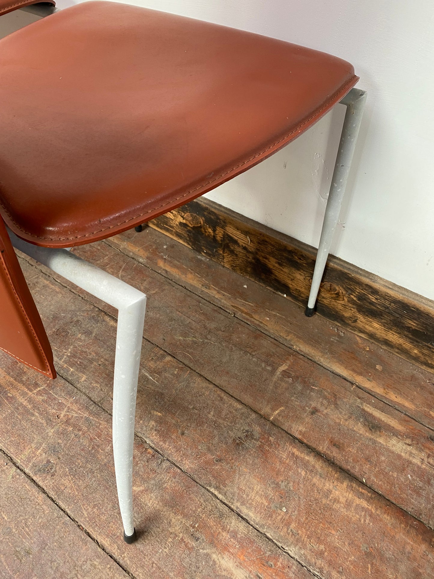 Set of four Italian leather dining chairs