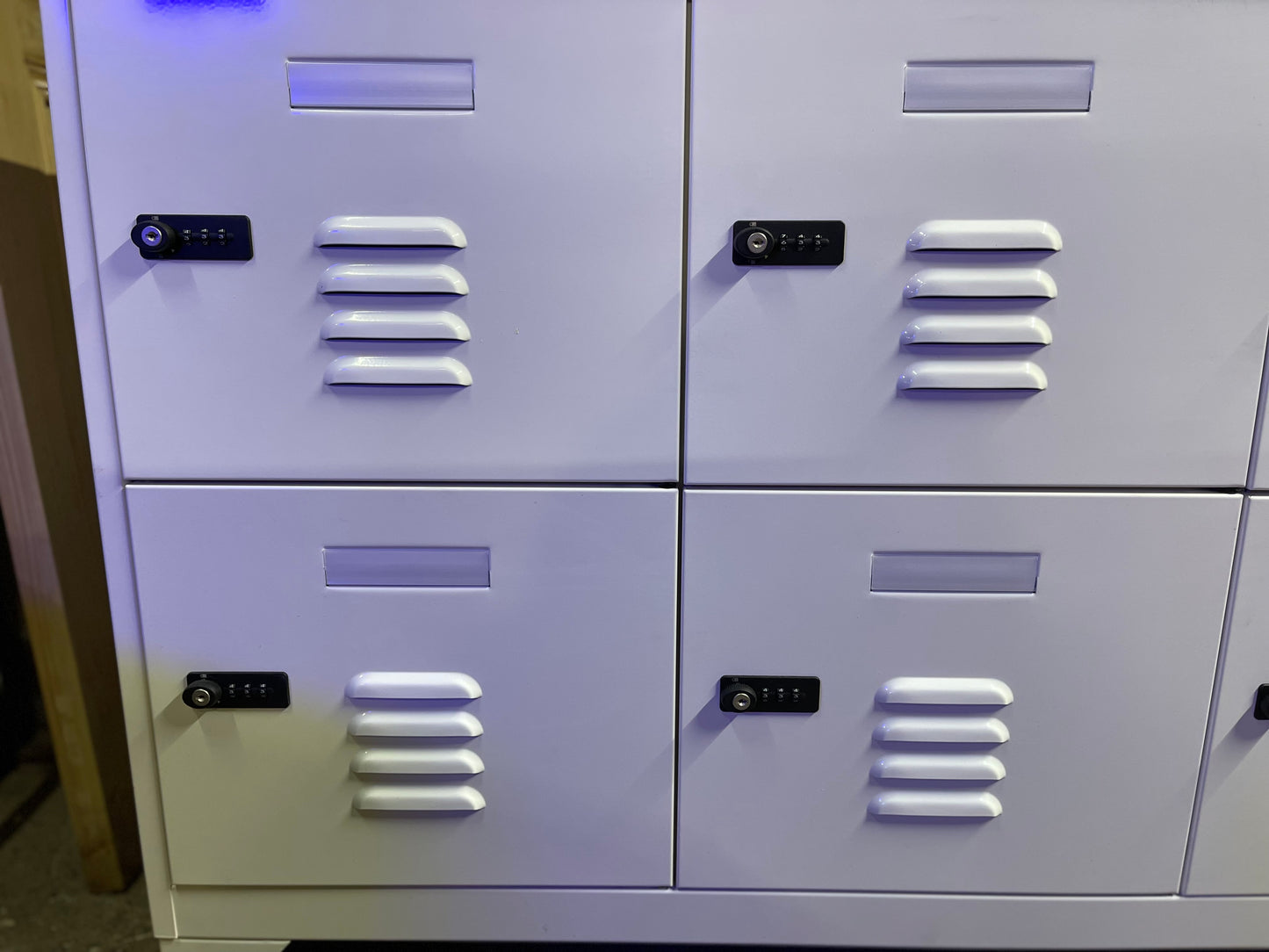 White metal cabinet with 6 individual lockers