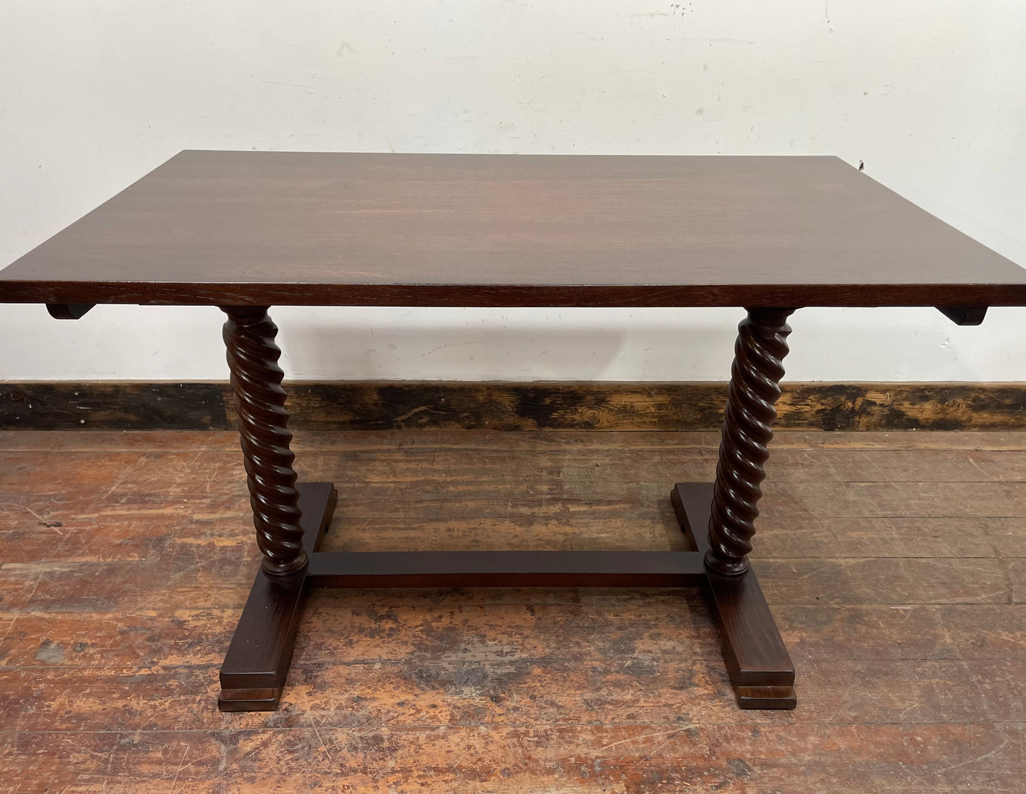 Pair of rectangular wooden pub tables with decorative legs