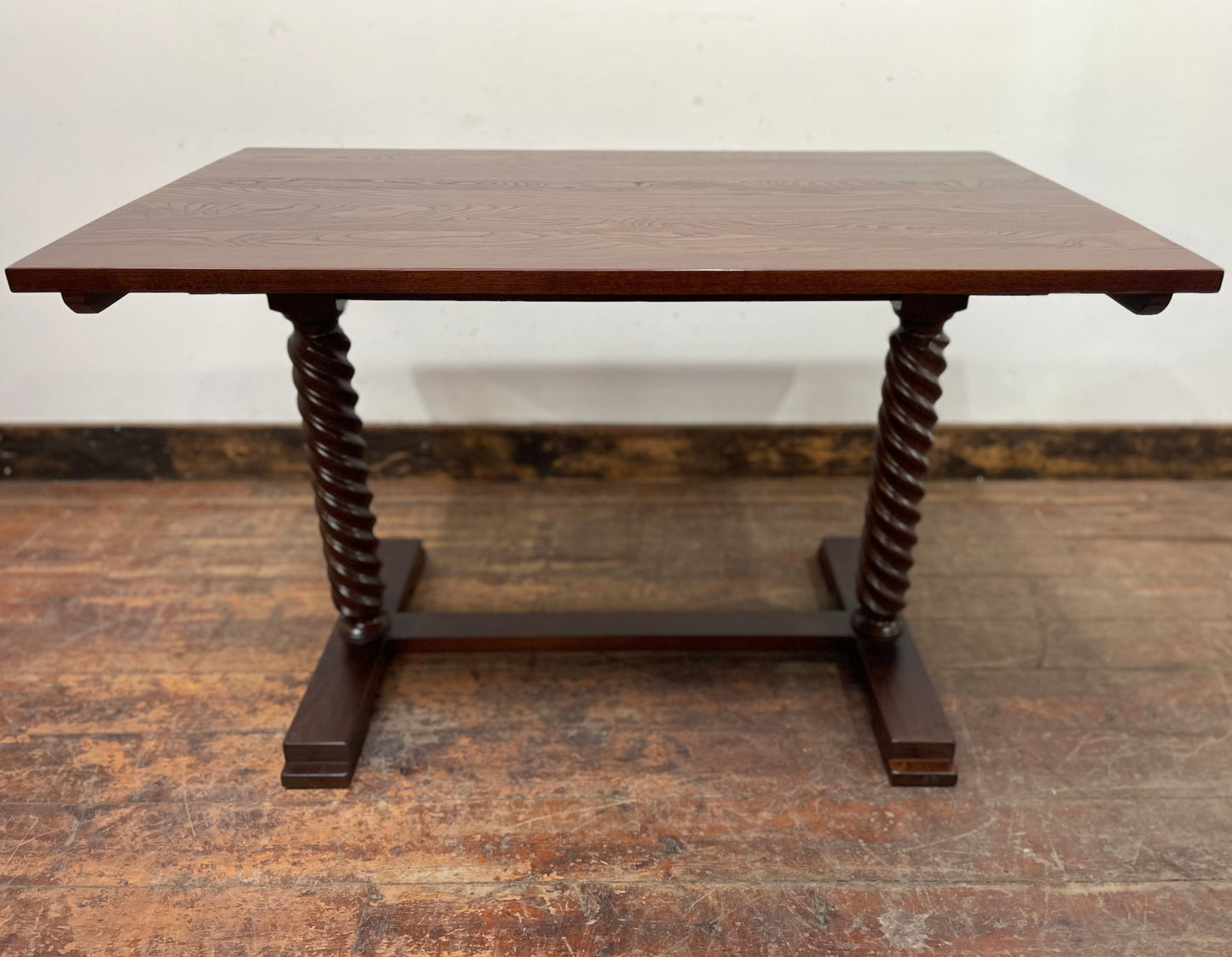 Pair of rectangular wooden pub tables with decorative legs