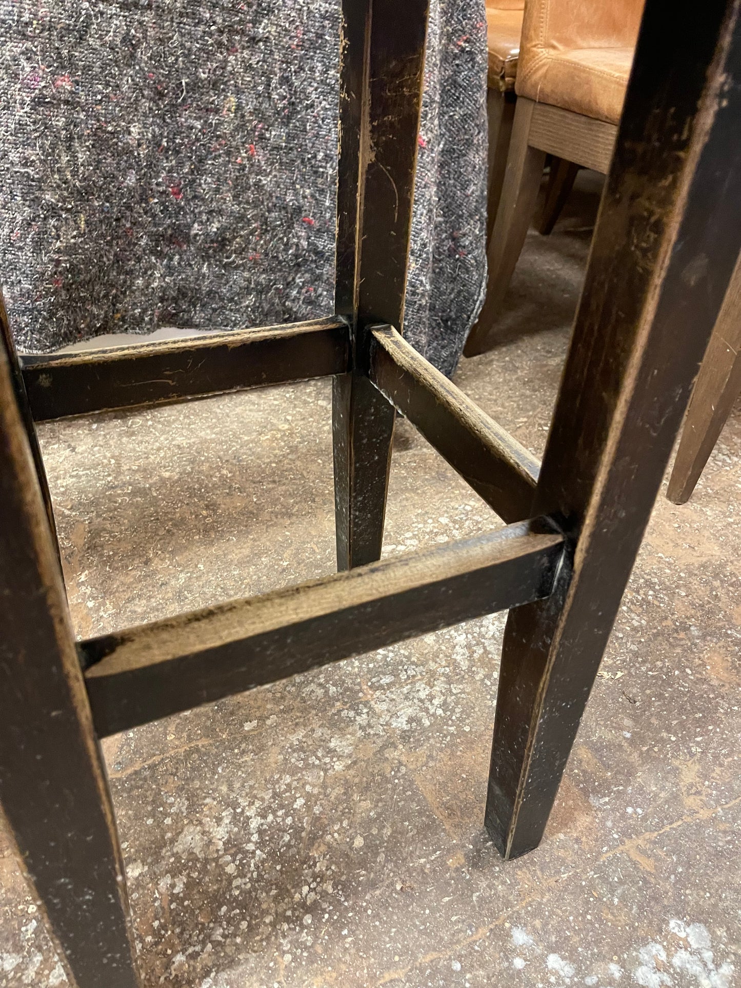 Pair of square tan leather bar stools