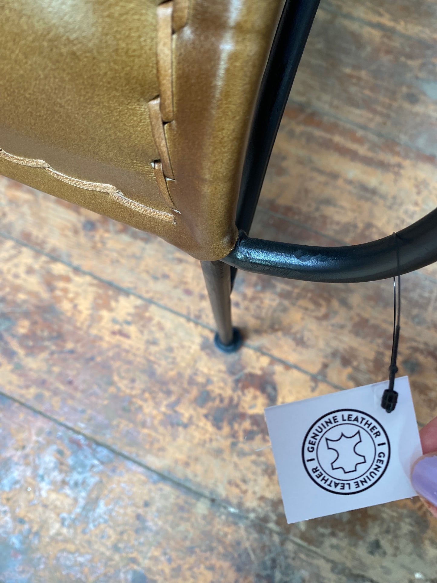 Reclined tan / brown leather armchair