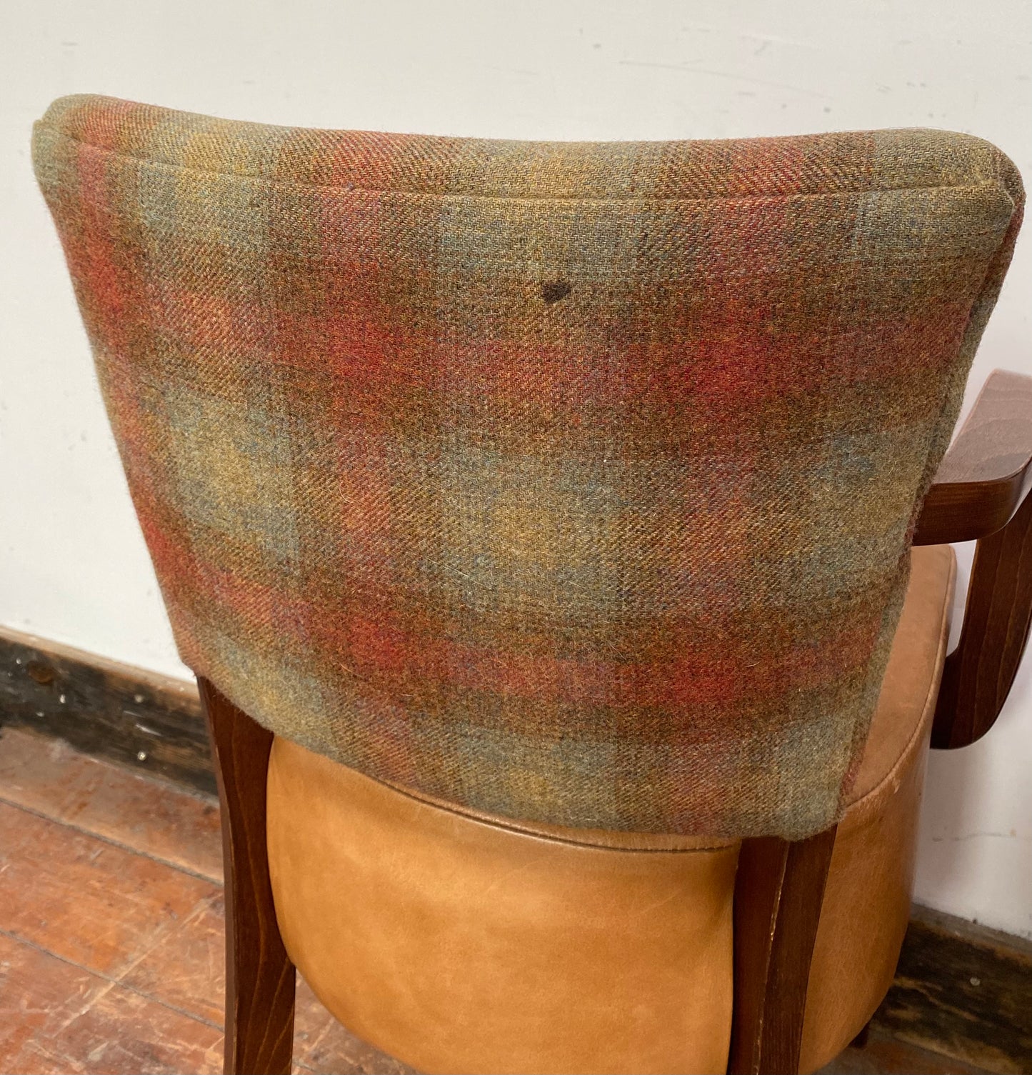 Pair of tan leather and check fabric chairs