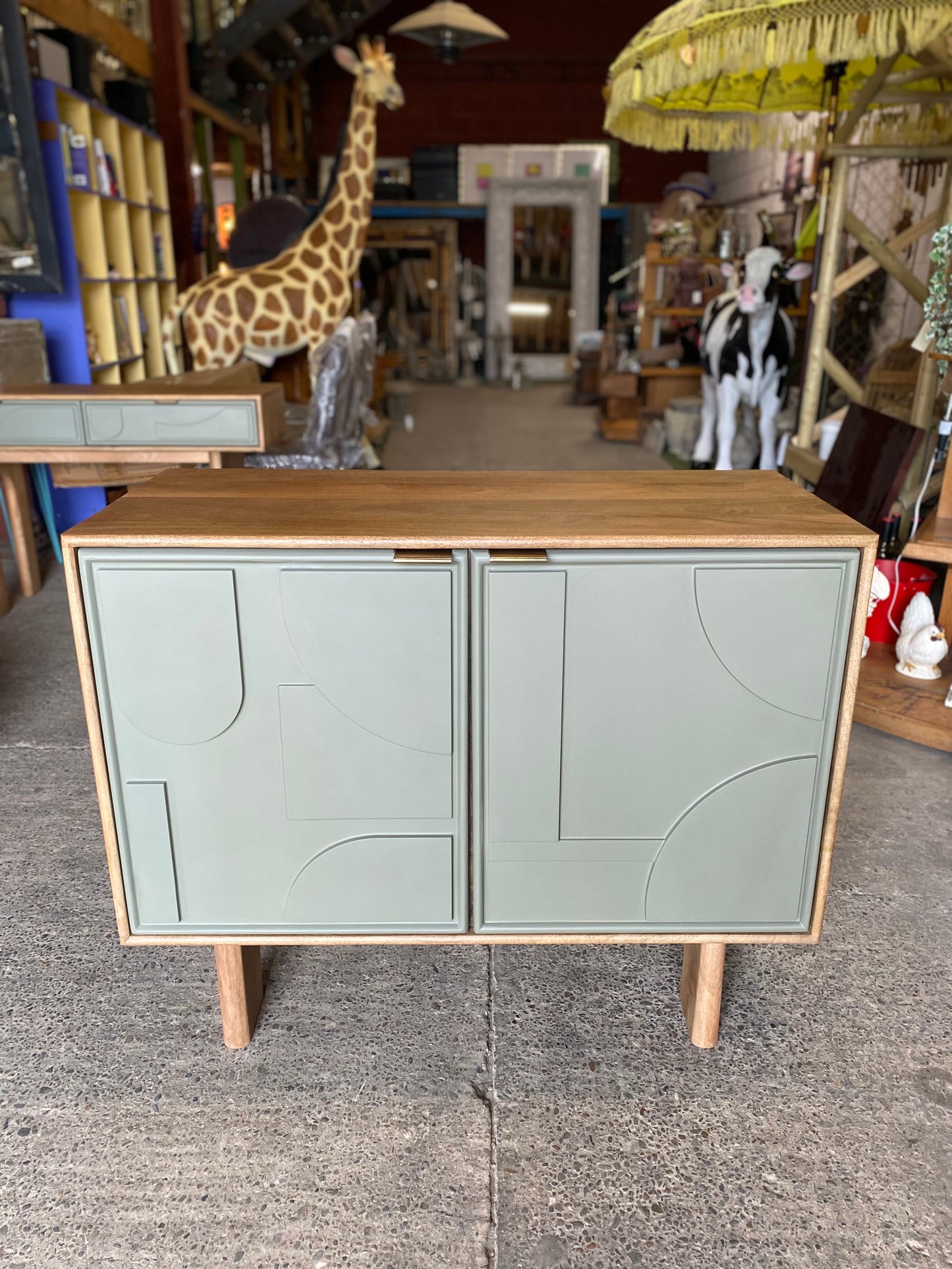Stylish cabinet with geometric door design