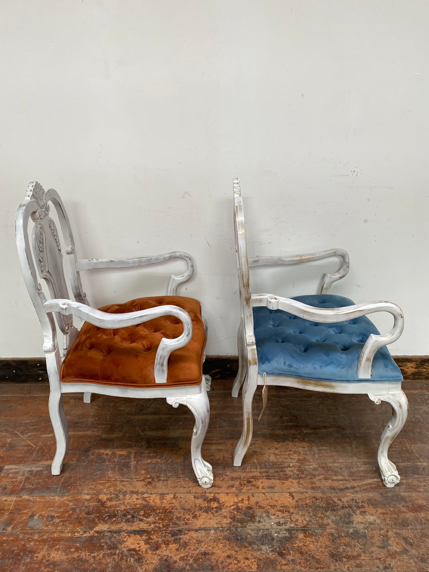Pair of white shabby chic chairs blue and orange