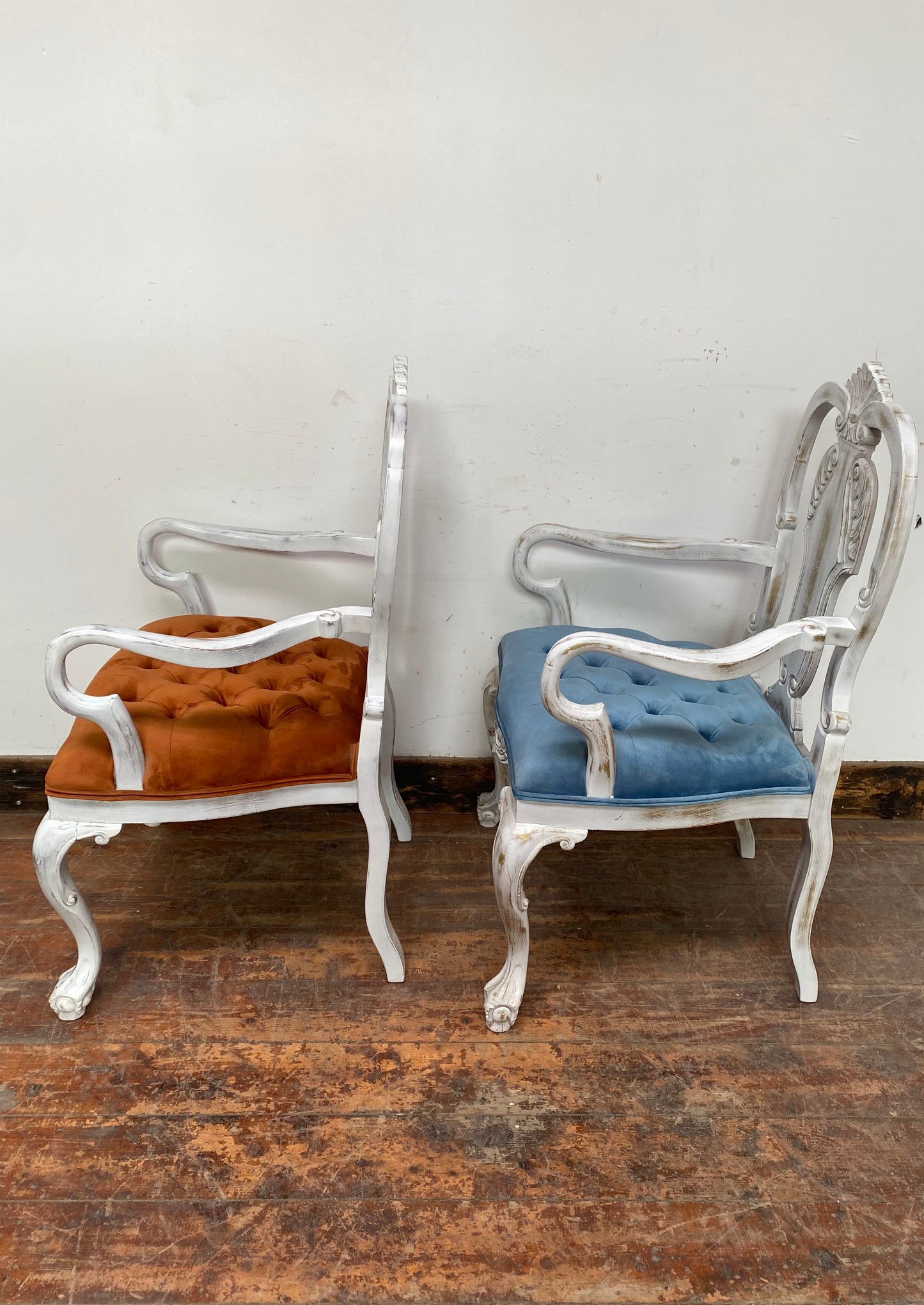 Pair of white shabby chic chairs blue and orange