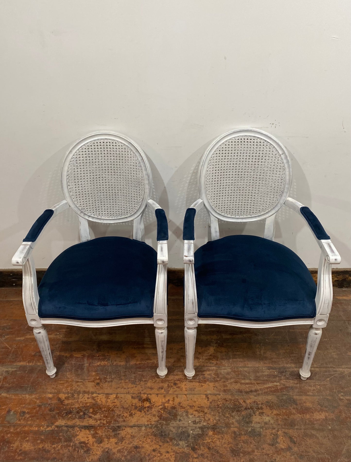Pair of white shabby chic chairs with blue seats