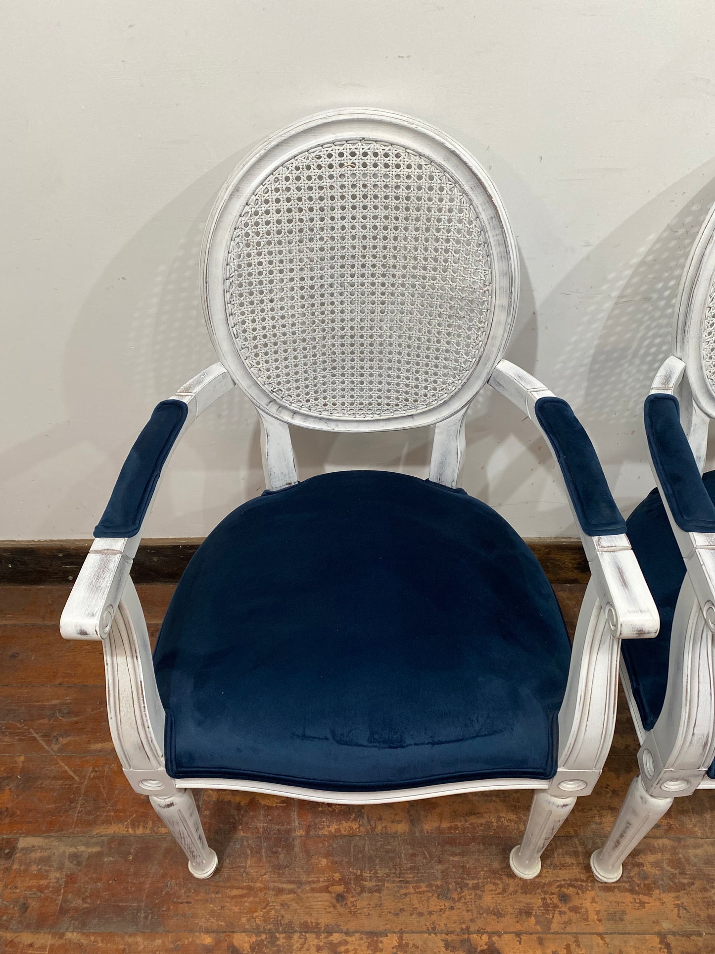 Pair of white shabby chic chairs with blue seats
