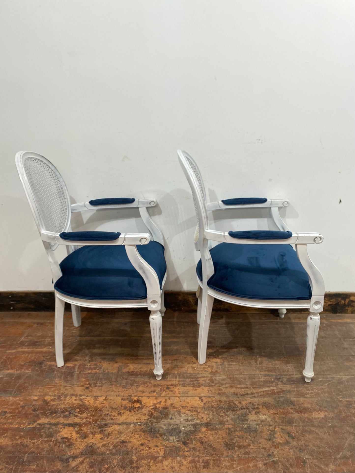 Pair of white shabby chic chairs with blue seats