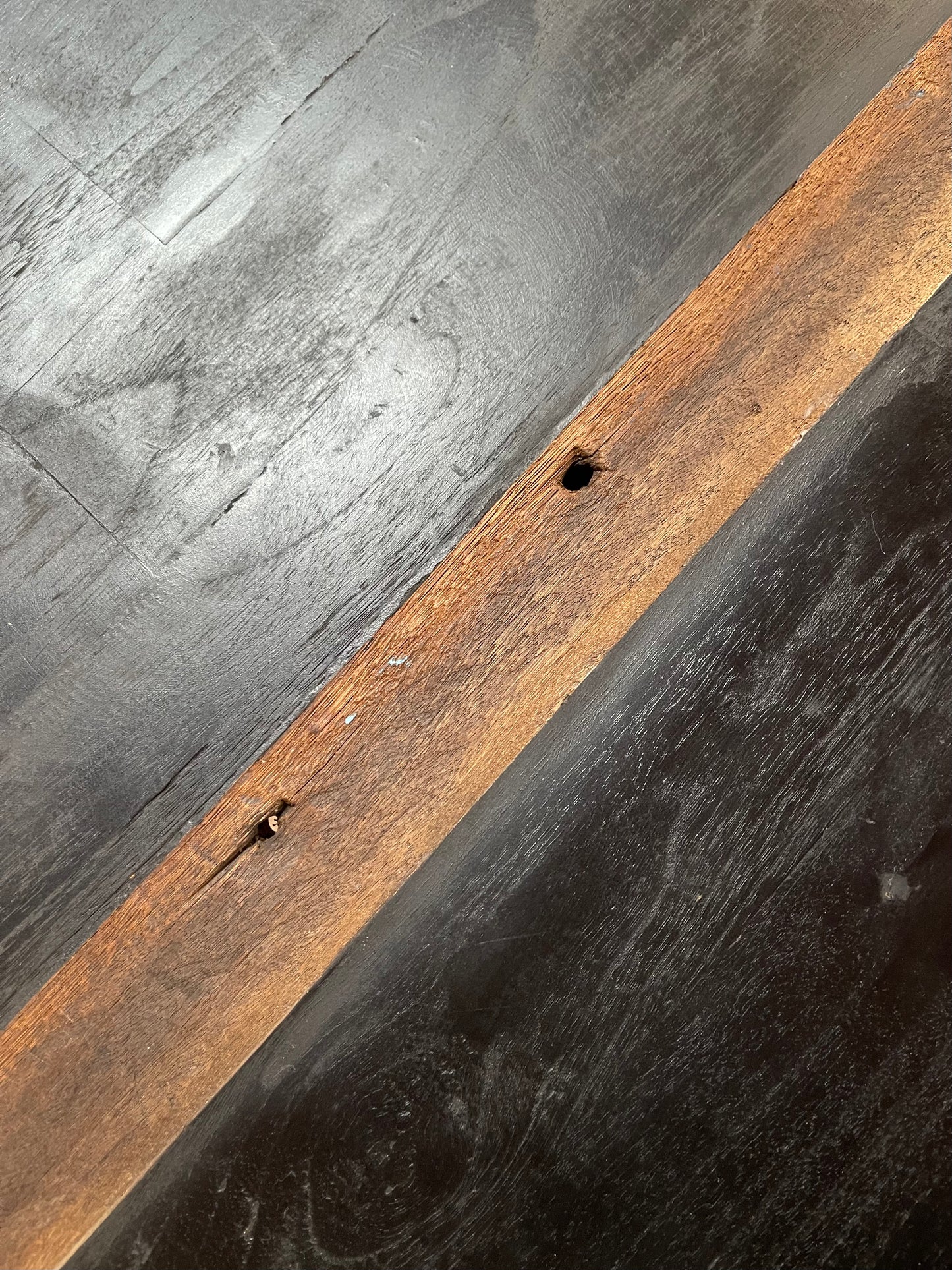 Pair of blue faux-leather chairs and black round table