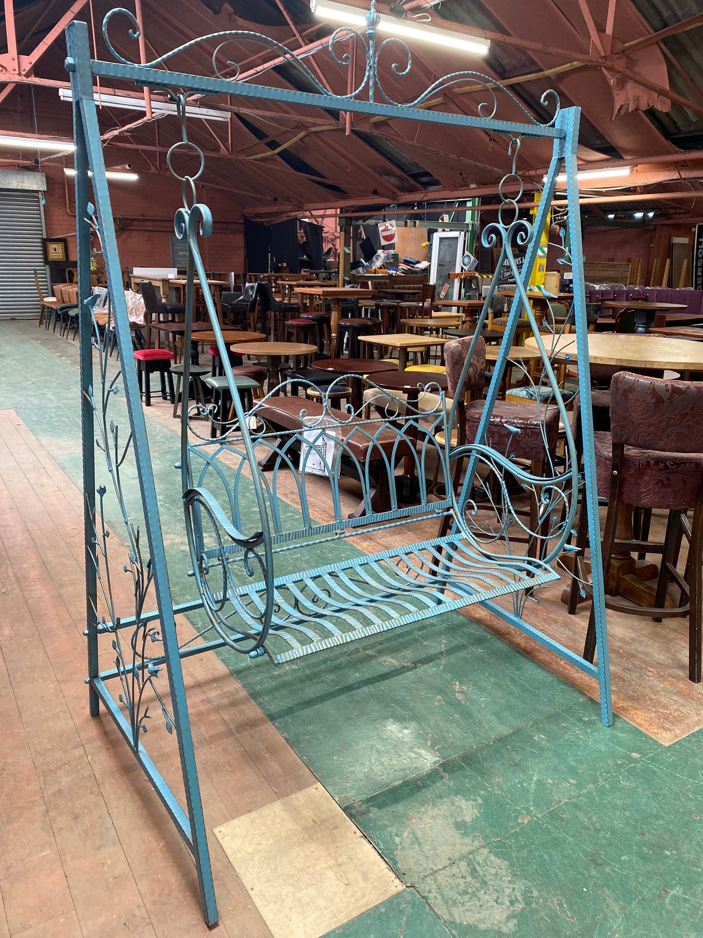 Blue metal garden swing seat