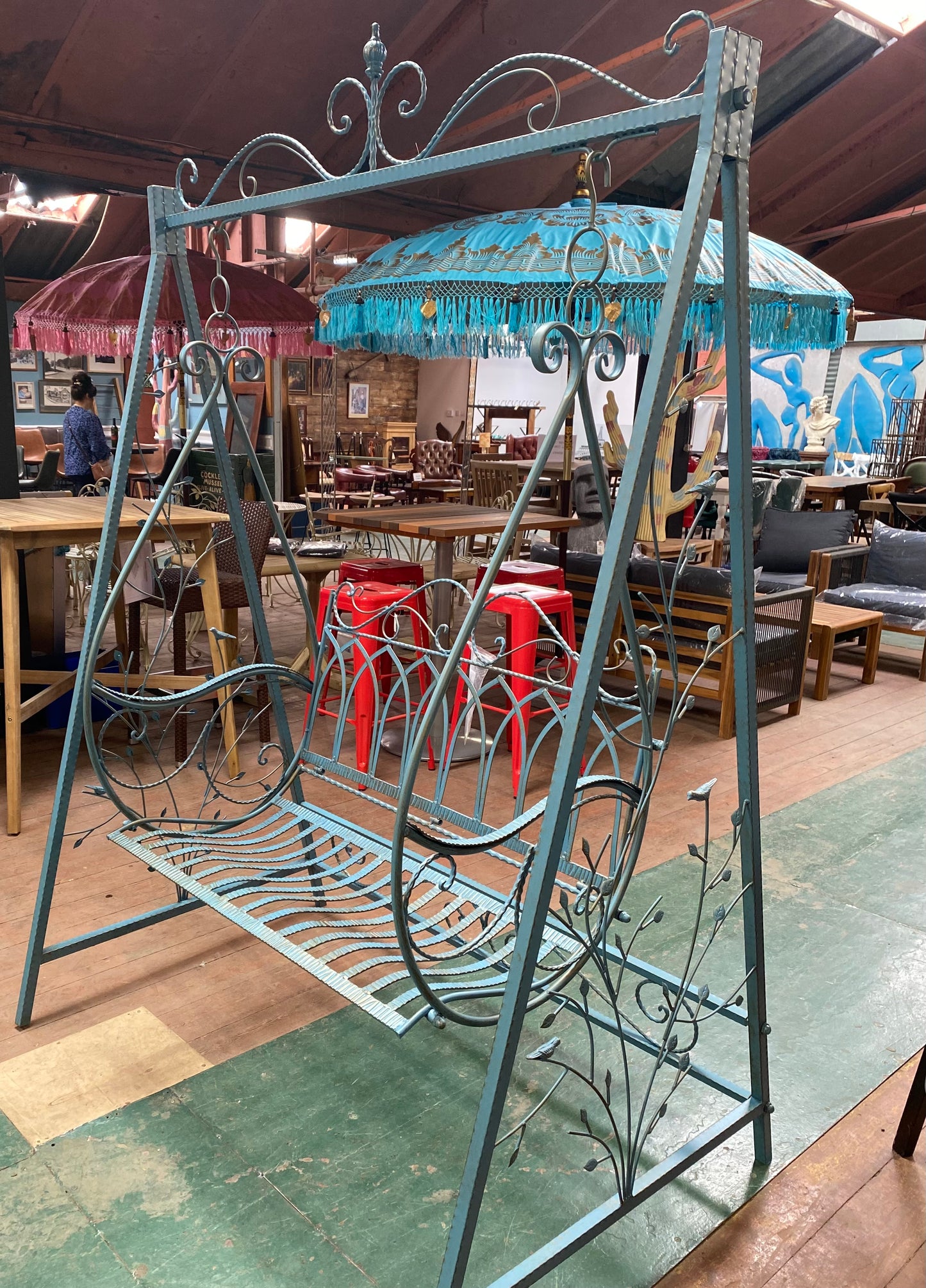 Blue metal garden swing seat