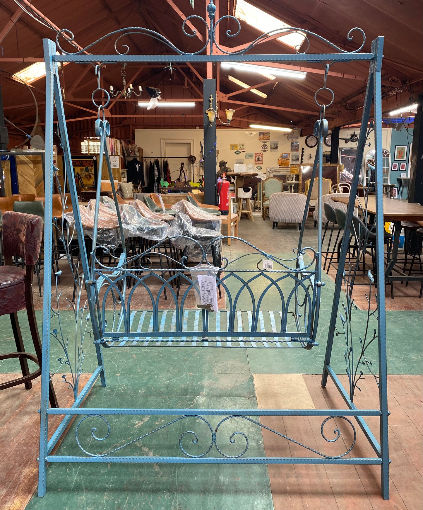 Blue metal garden swing seat