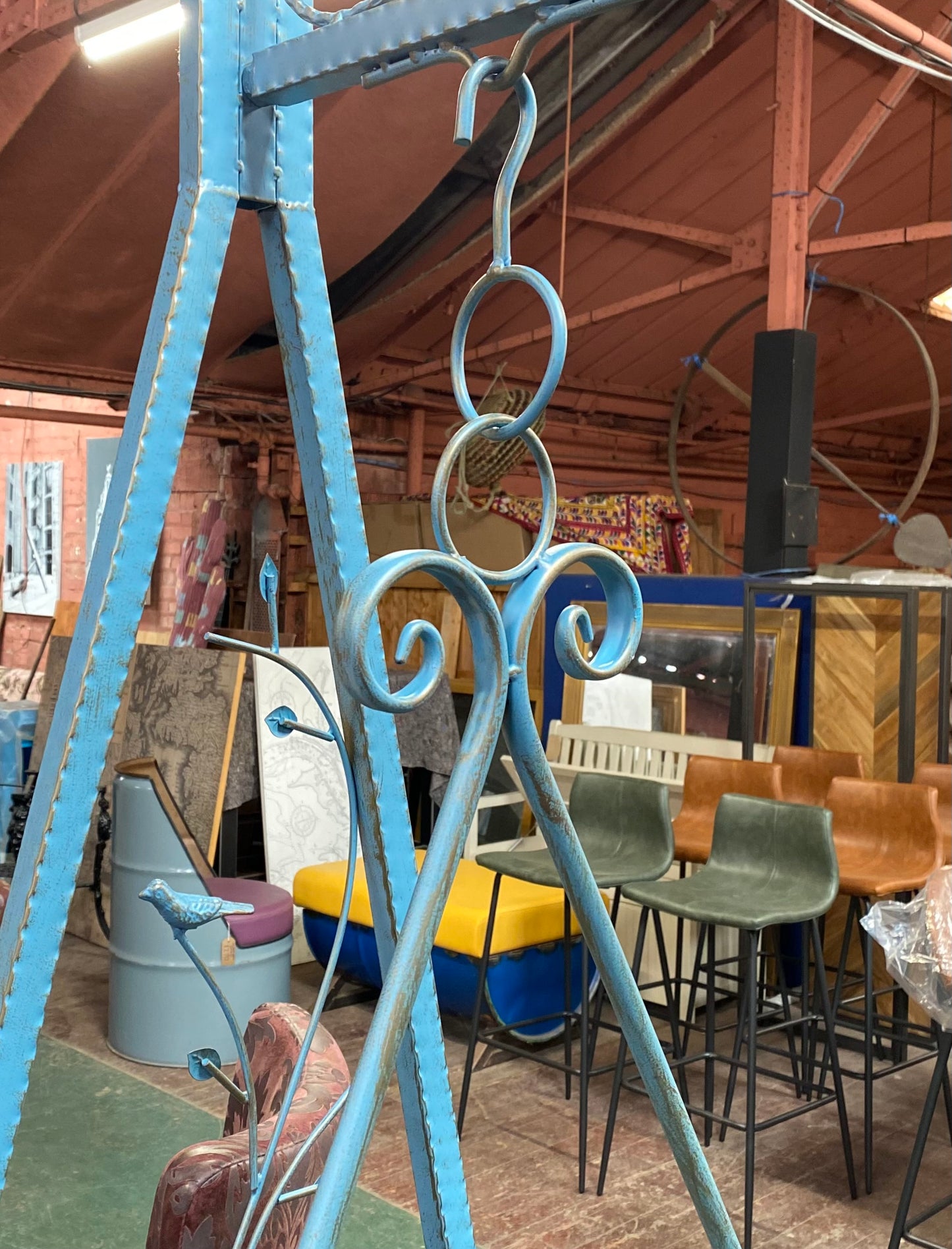 Blue metal garden swing seat