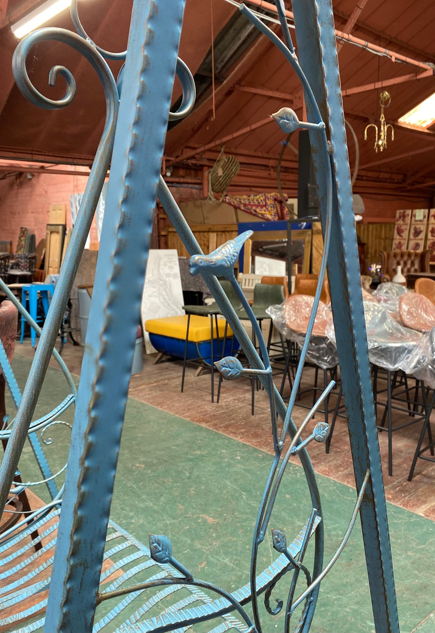 Blue metal garden swing seat