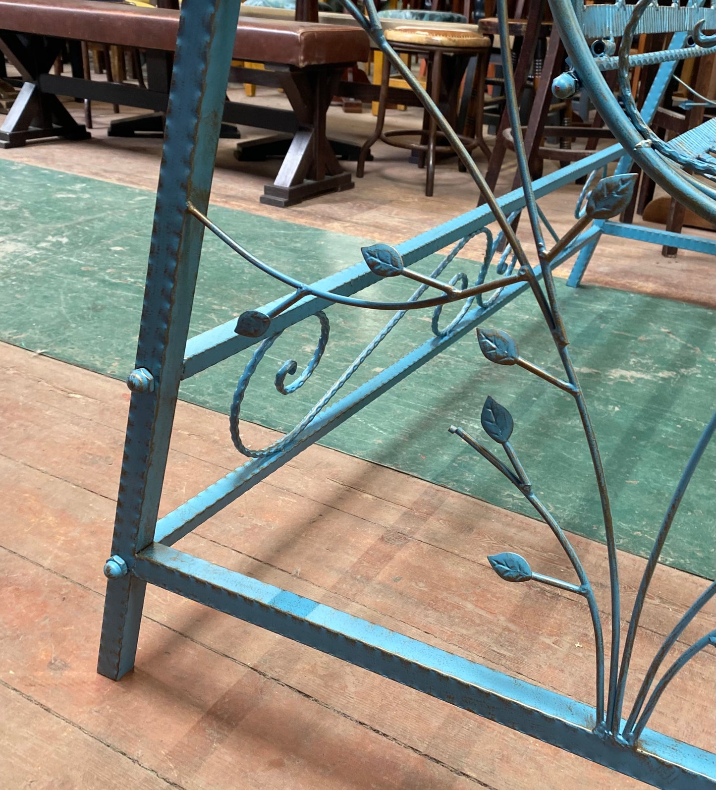 Blue metal garden swing seat