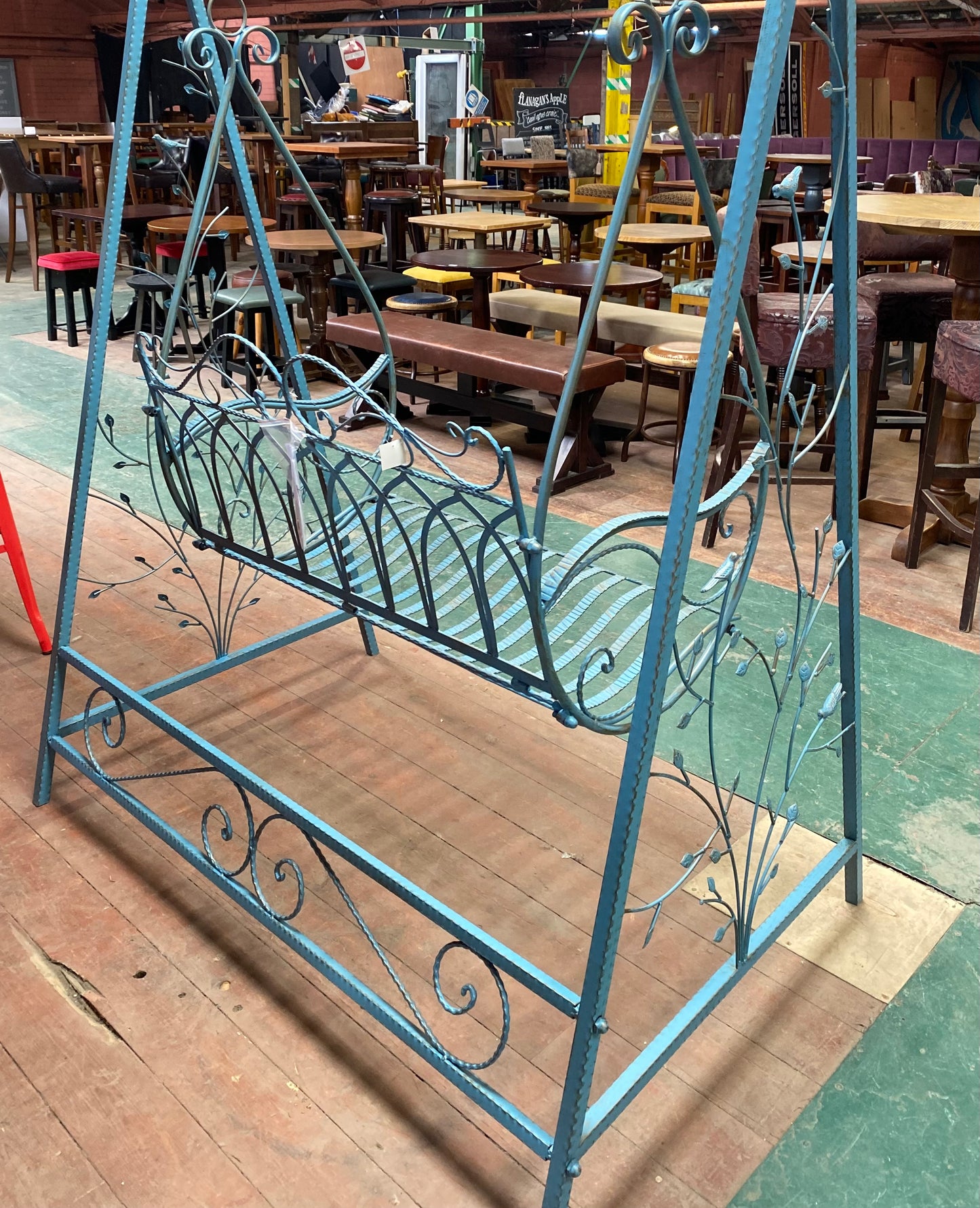 Blue metal garden swing seat