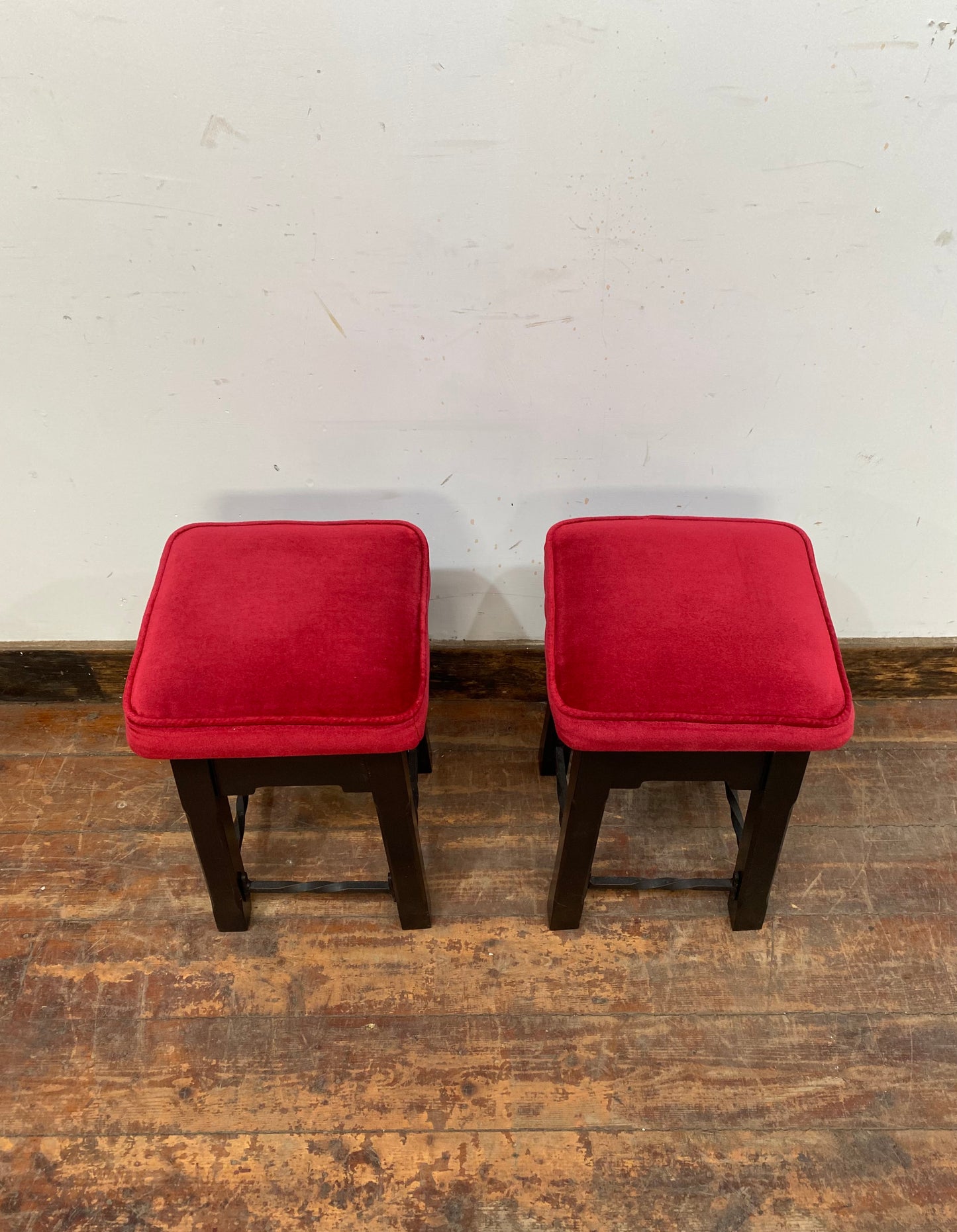 Low bar stools with red velvet-feel tops
