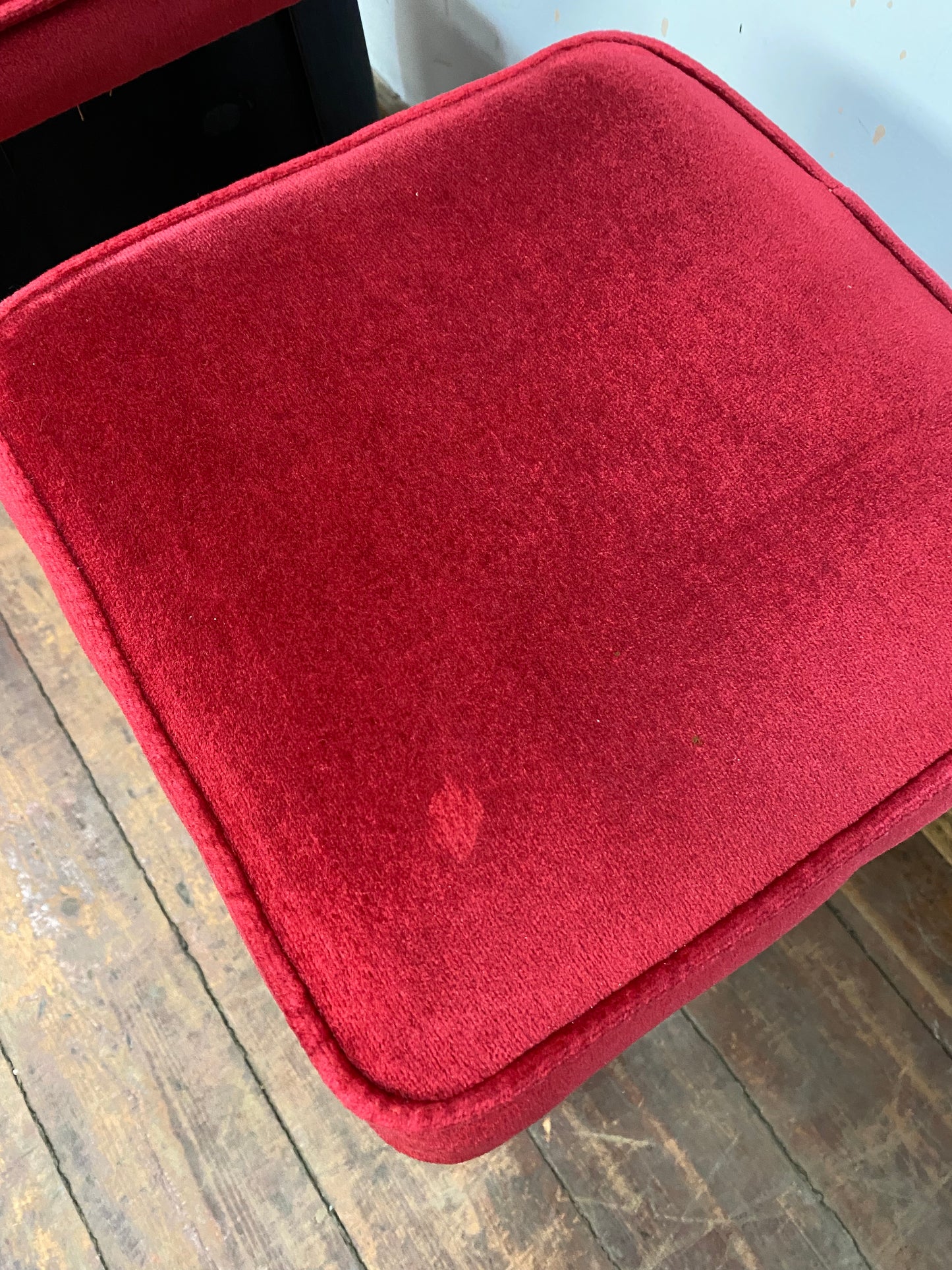 Low bar stools with red velvet-feel tops