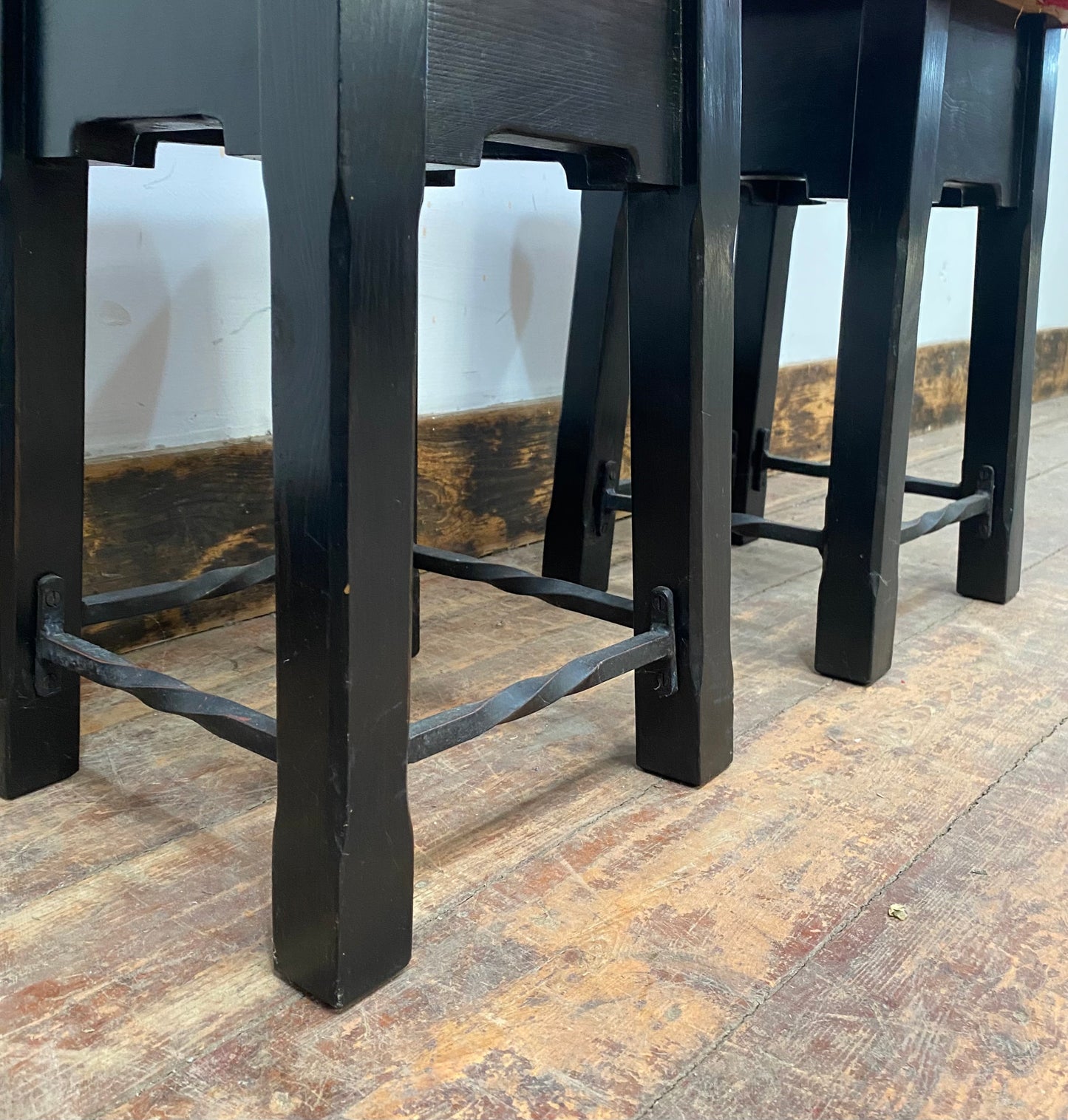 Low bar stools with red velvet-feel tops