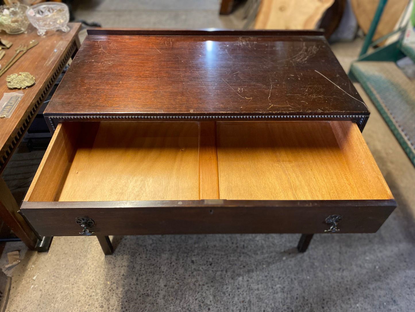Small vintage chest of drawers in dark wood