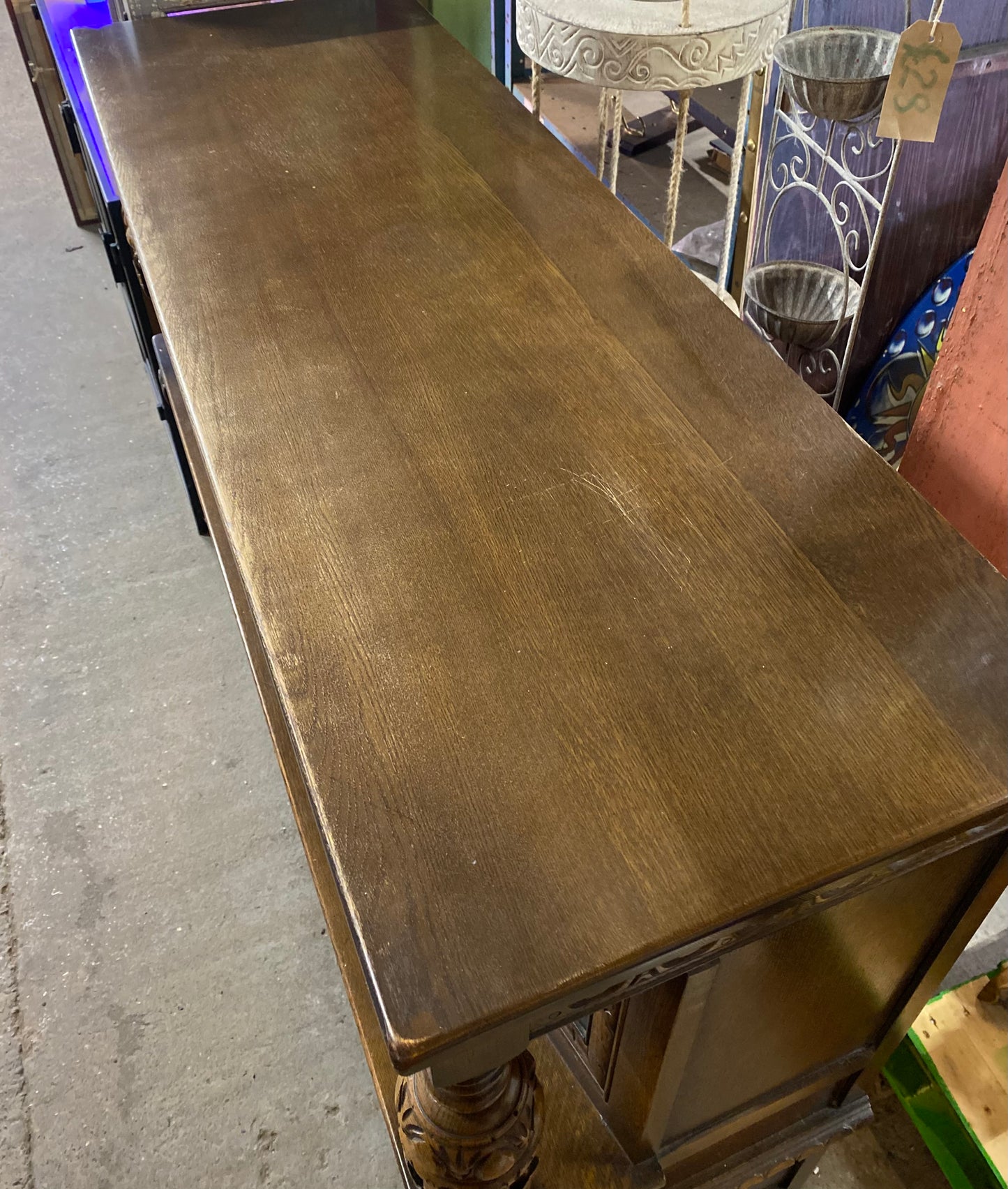 Antique solid oak tall sideboard / cabinet with ornate carvings