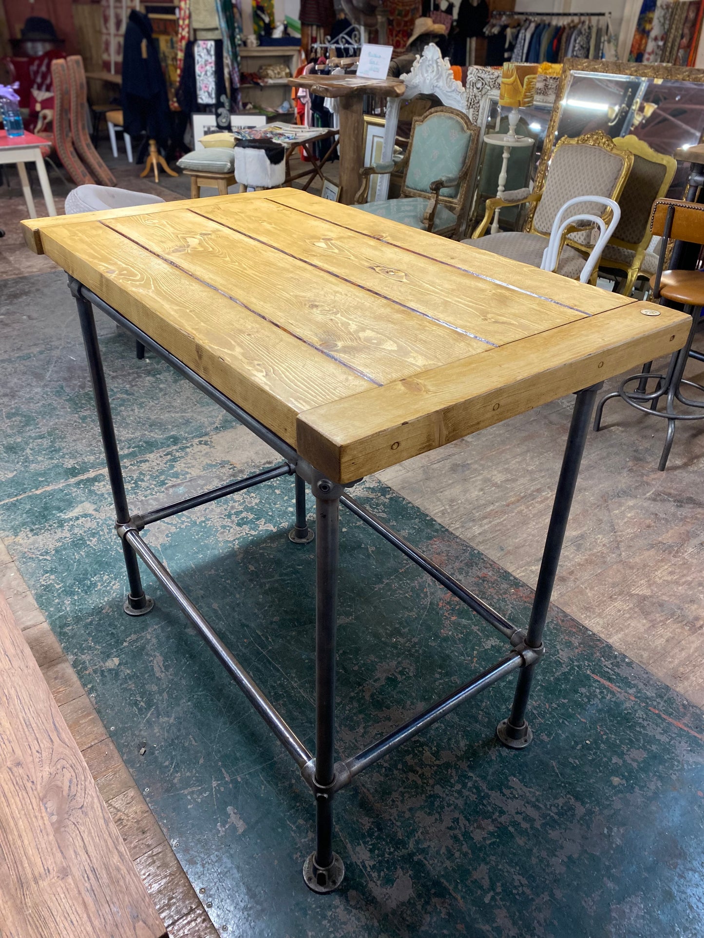 Poseur table with industrial metal base