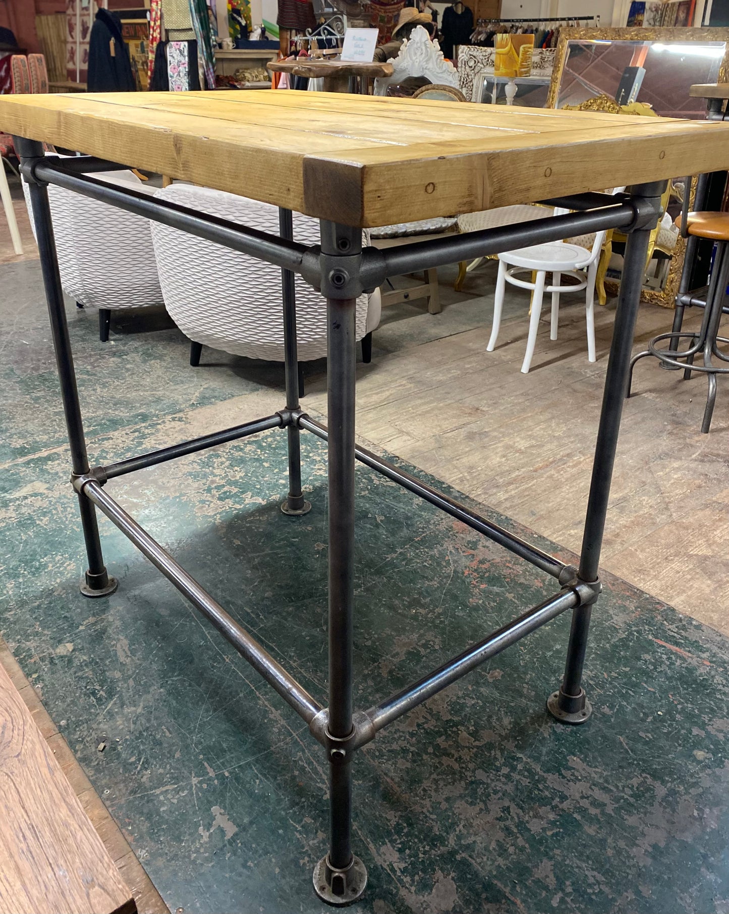 Poseur table with industrial metal base