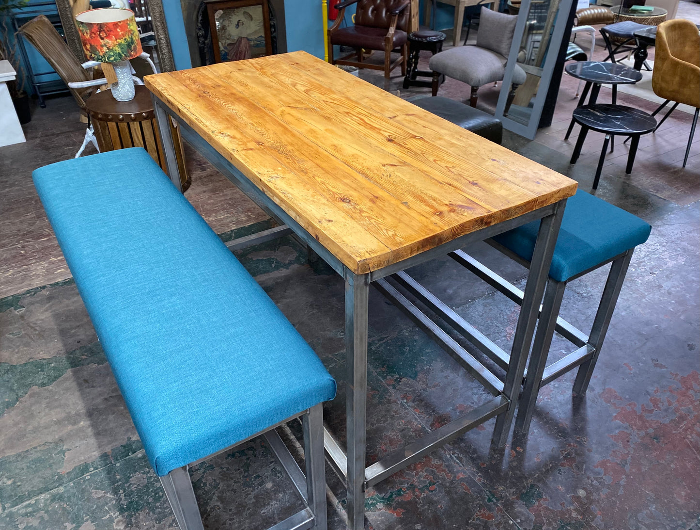 Industrial metal framed poseur table and benches