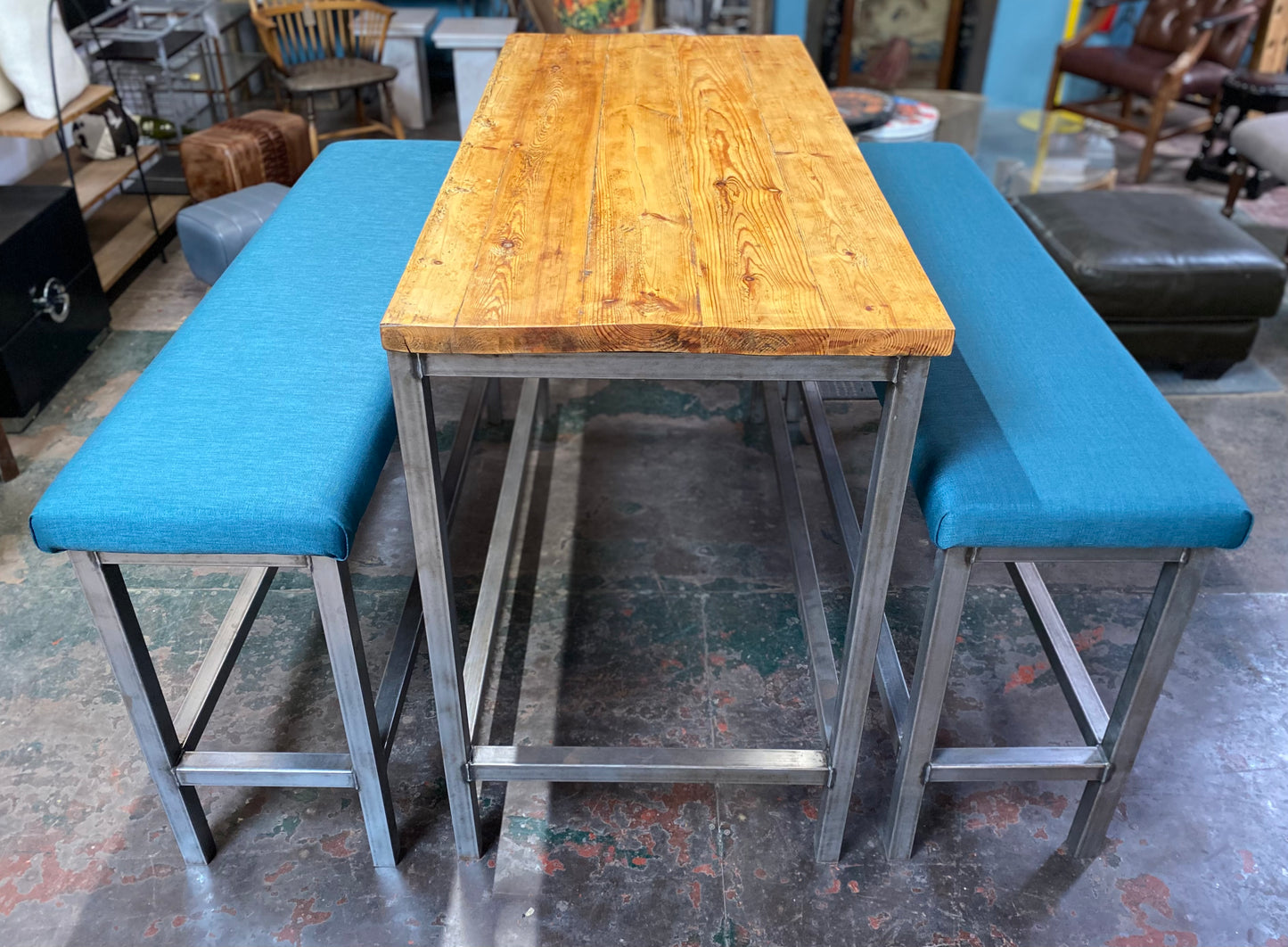 Industrial metal framed poseur table and benches