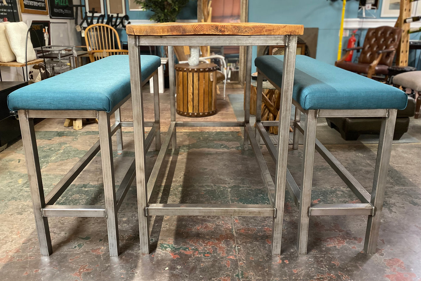 Industrial metal framed poseur table and benches