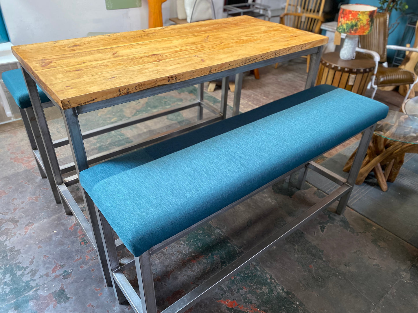 Industrial metal framed poseur table and benches