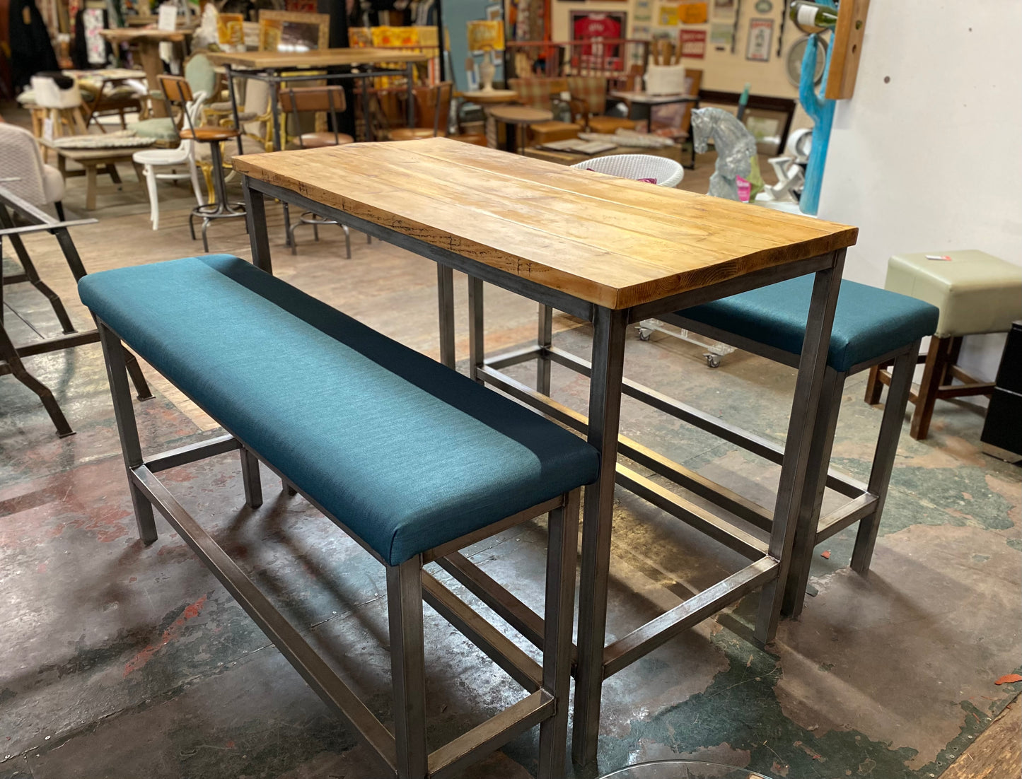 Industrial metal framed poseur table and benches